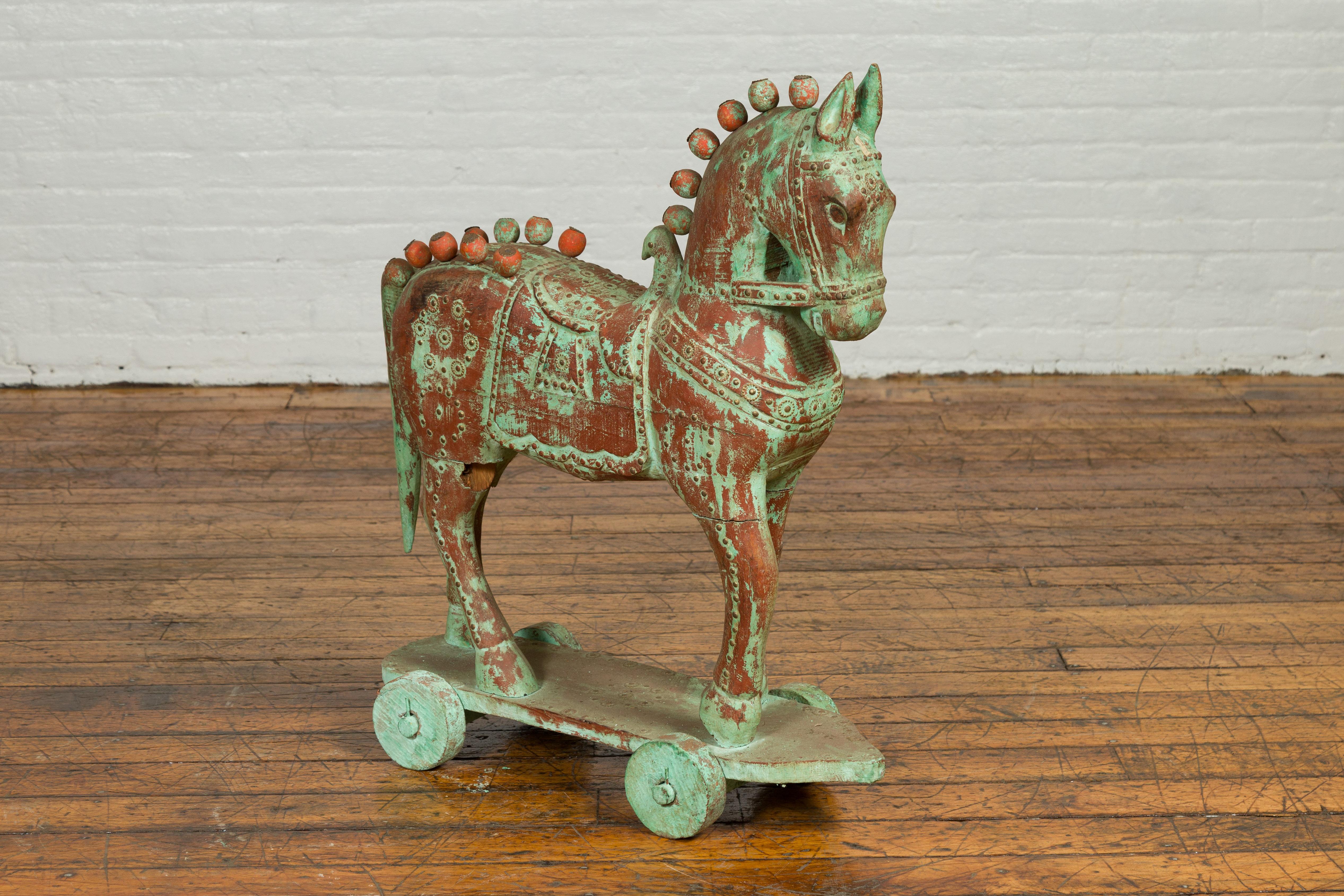 20th Century Handmade Vintage Indian Temple Horse Toy on Wheels from Madras with Spheres For Sale