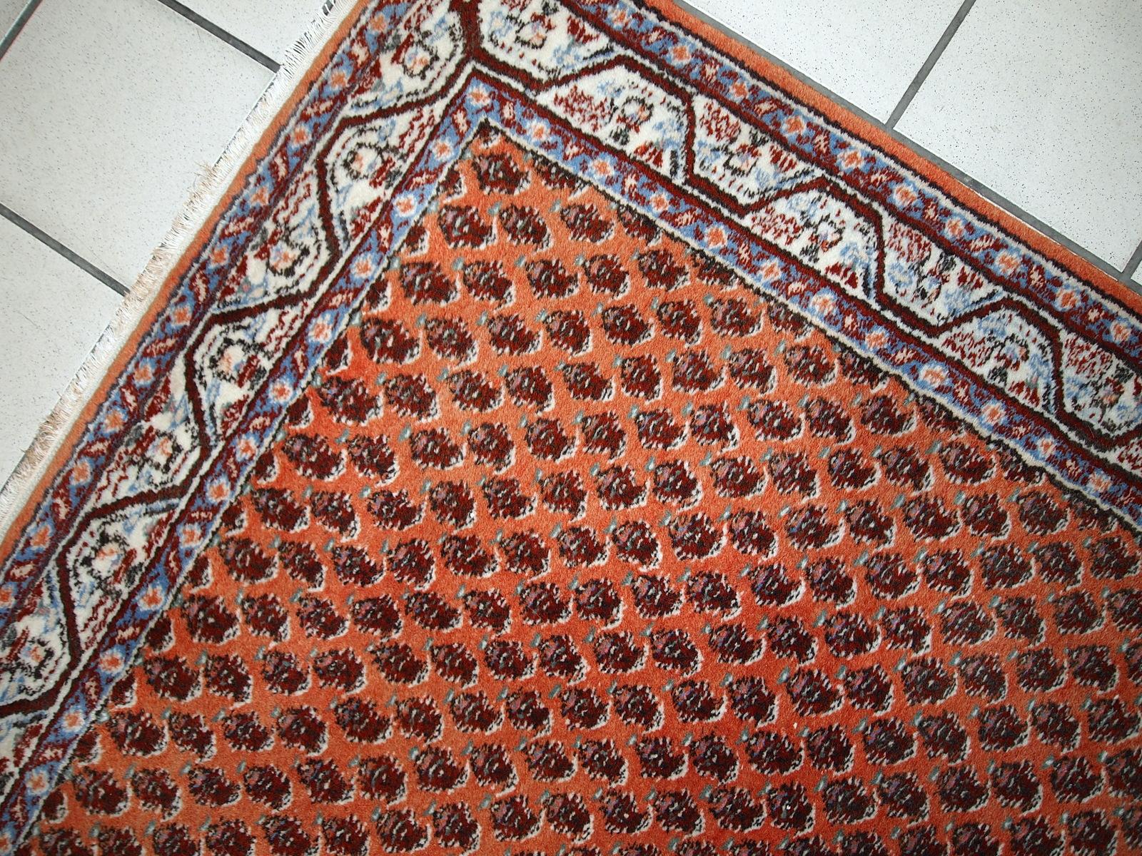 Handmade vintage Uzbek Bukhara rug in original good condition. The rug made in soft wool in the middle of 20th century. 

-condition: original good,

-circa: 1960s,

-size: 3.9' x 5.8' (121cm x 177cm),

-material: wool,

-country of origin: