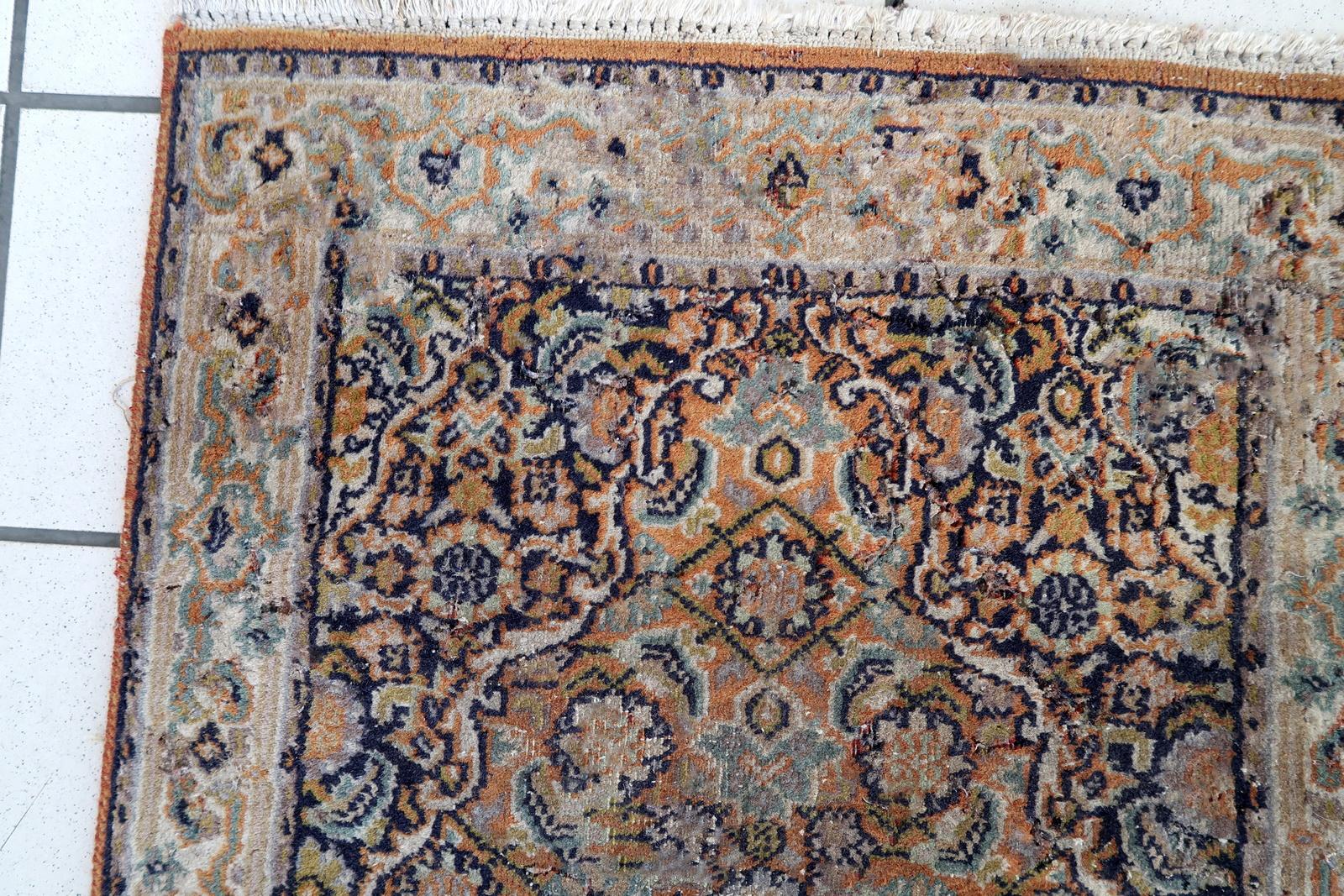 Handmade vintage Indian Tabriz runner in original condition, it has some signs of age. The rug has been made in in the end of 20th century in wool.


-condition: original, some signs of age,

-circa: 1970s,

-size: 1.9' x 5.8' (60cm x