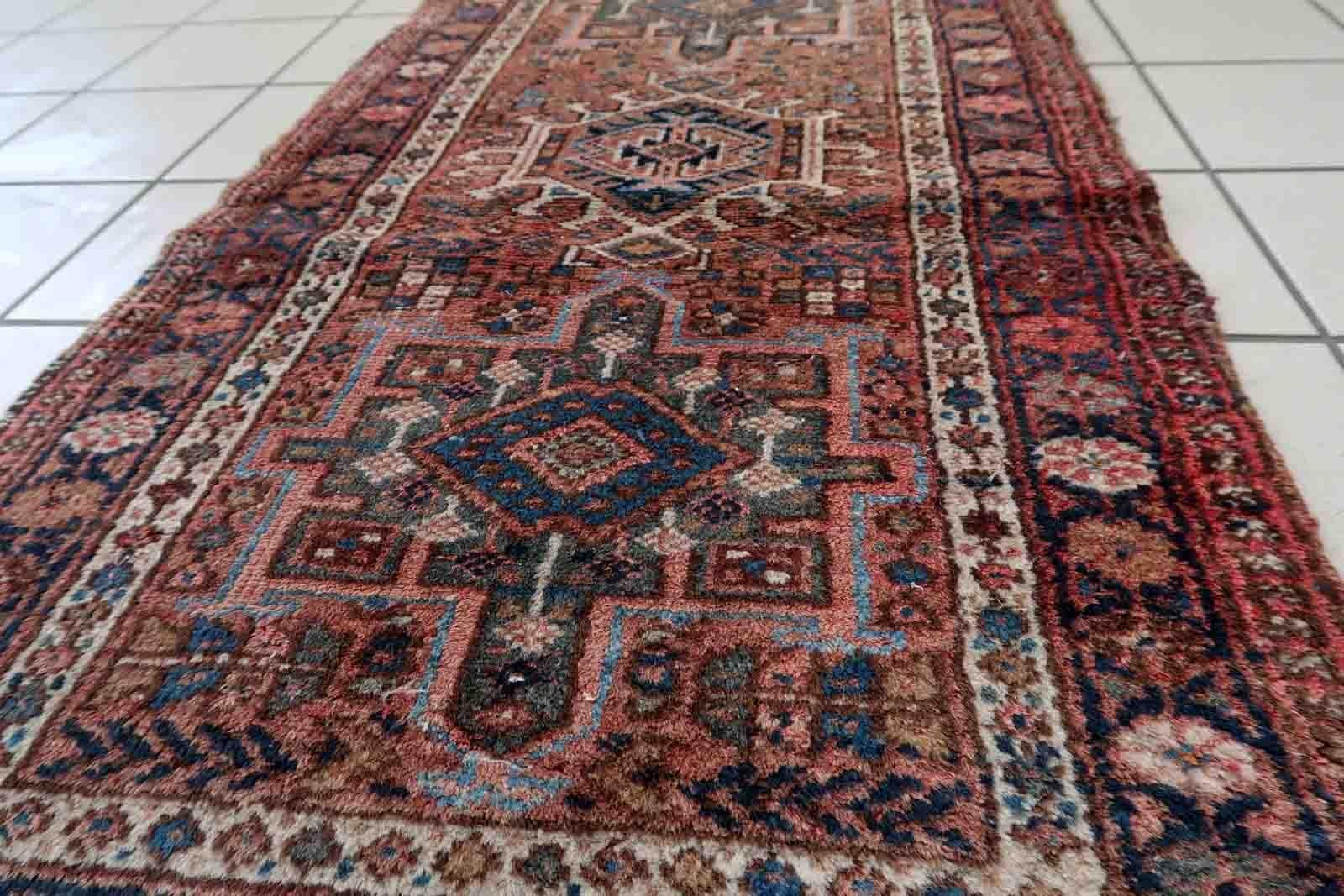 Handmade vintage Karajeh rug in traditional triple medallion design. The rug is in pale red color. It is from the end of 20th century in original good condition.

-condition: original good,

-circa: 1970s,

-size: 2.1' x 3.8' (66cm x