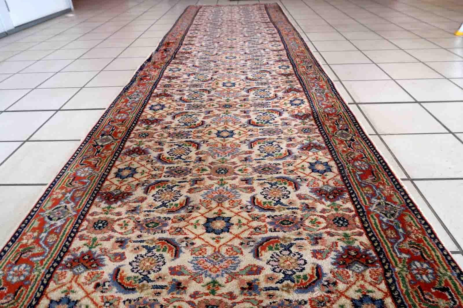 Handmade vintage Persian Mahal runner in all-over design. The runner is from the end of 20th century in good condition, it has some old restoration on one part of the border.

-condition: good, some restorations,

-circa: 1960s,

-size: 2.5' x