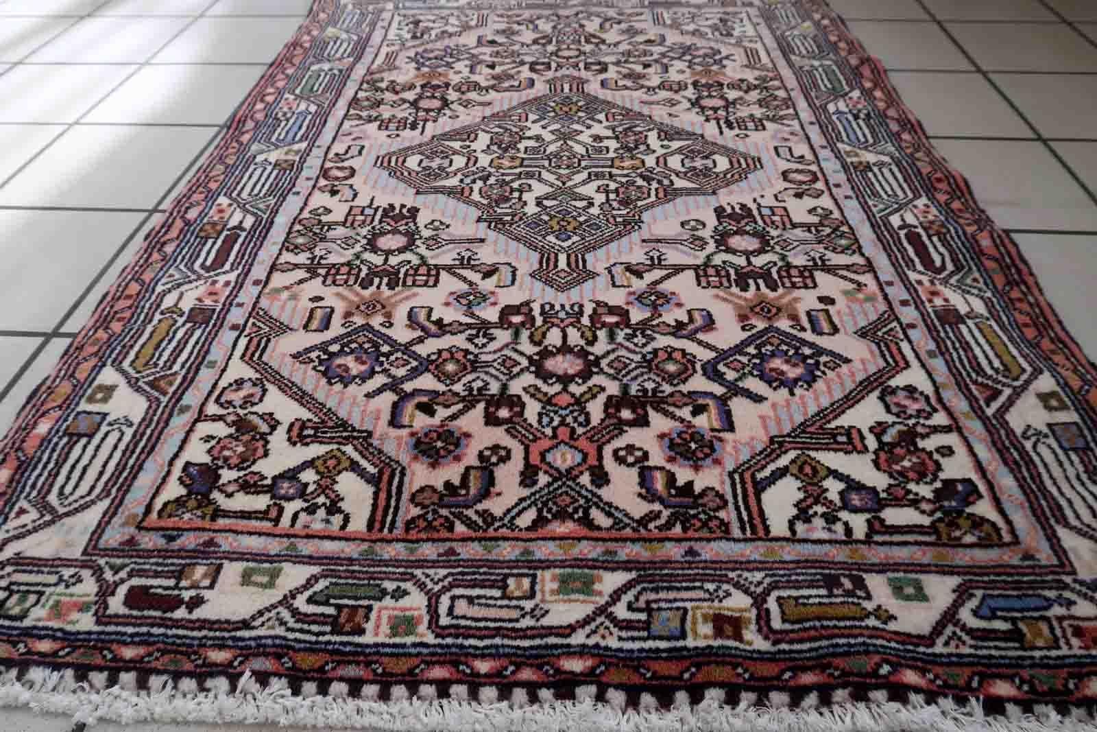 Handmade vintage Malayer rug in pink color. The rug is from the middle of 20th century in original good condition.

-Condition: original good.

-circa 1940s.

-Size: 2.7' x 3.4' (84cm x 120cm).

-Material: wool.

-Country of origin: Middle