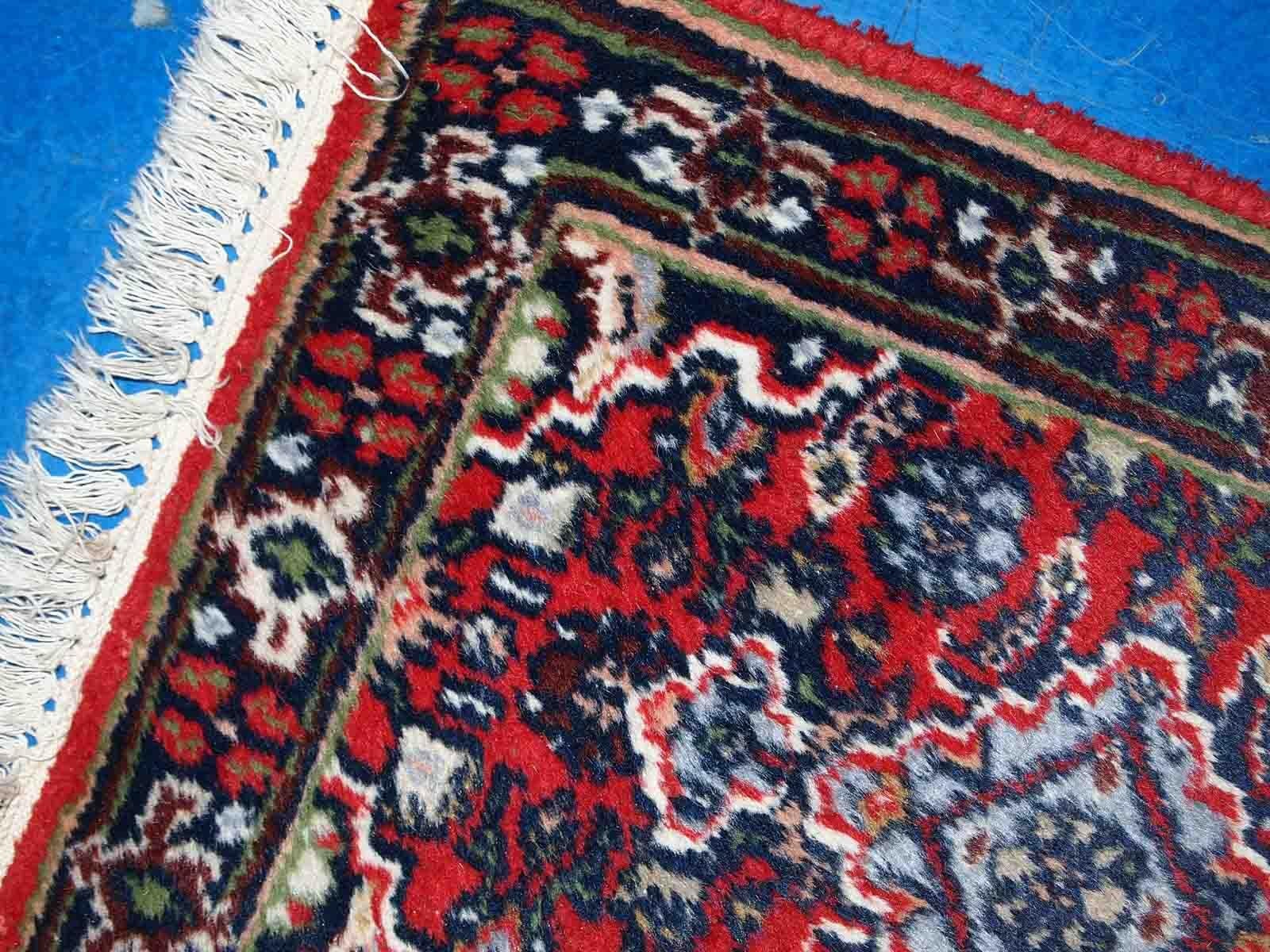 Vintage handmade Middle Eastern Malayer mat in original good condition. The rug is from the end of 20th century in red colour.

-condition: original good,

-circa: 1970s,

-size: 1.3' x 1.9' (40cm x 58cm),

-material: wool,

-country of
