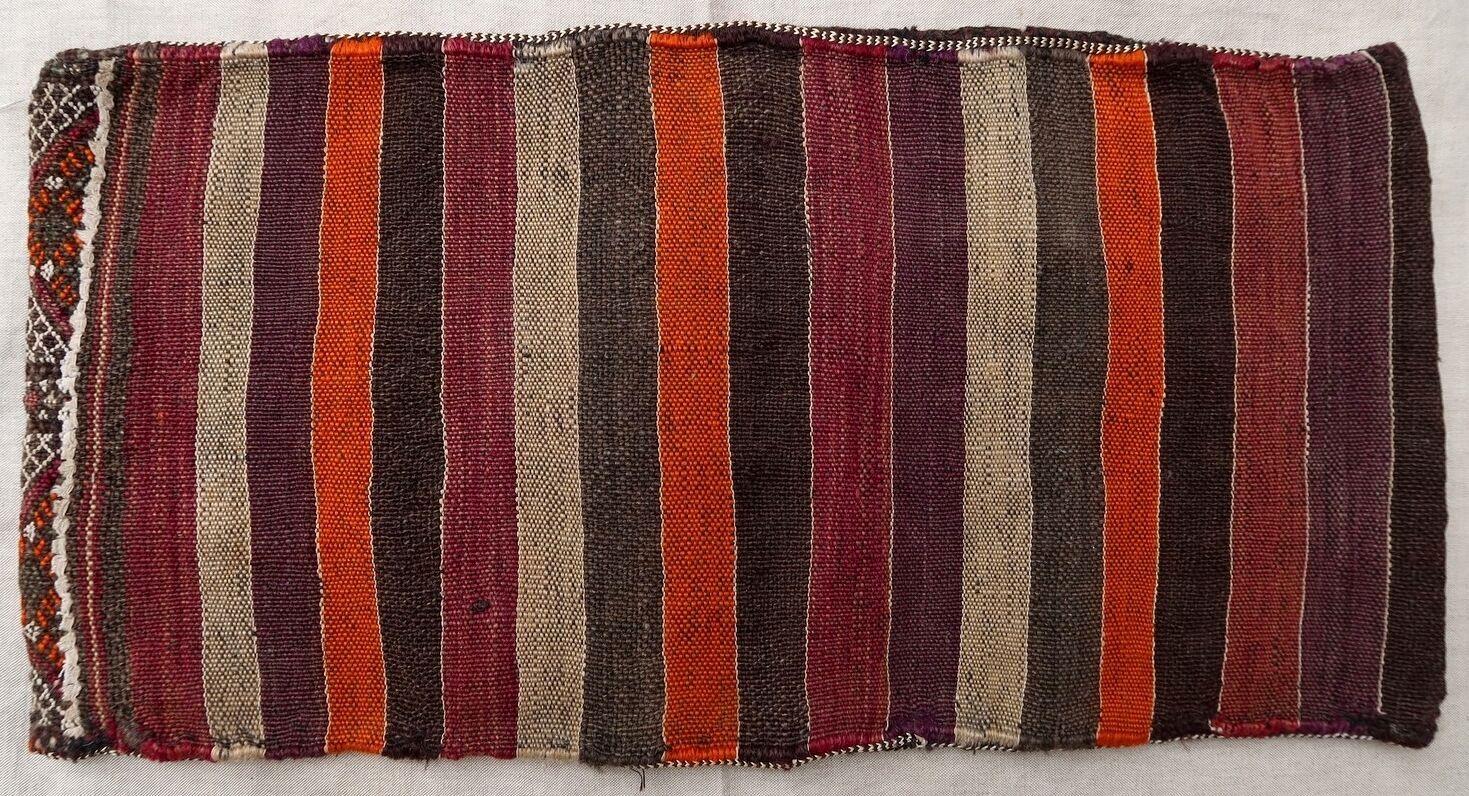 Handmade vintage Moroccan Berber cushion made out of vintage kilim. The flat-weave is from the middle of the 20th century, it is in original good condition. 

- Condition: original good,

- circa 1950s,

- Size: 1' x 2.1' (30cm x 65cm),

-