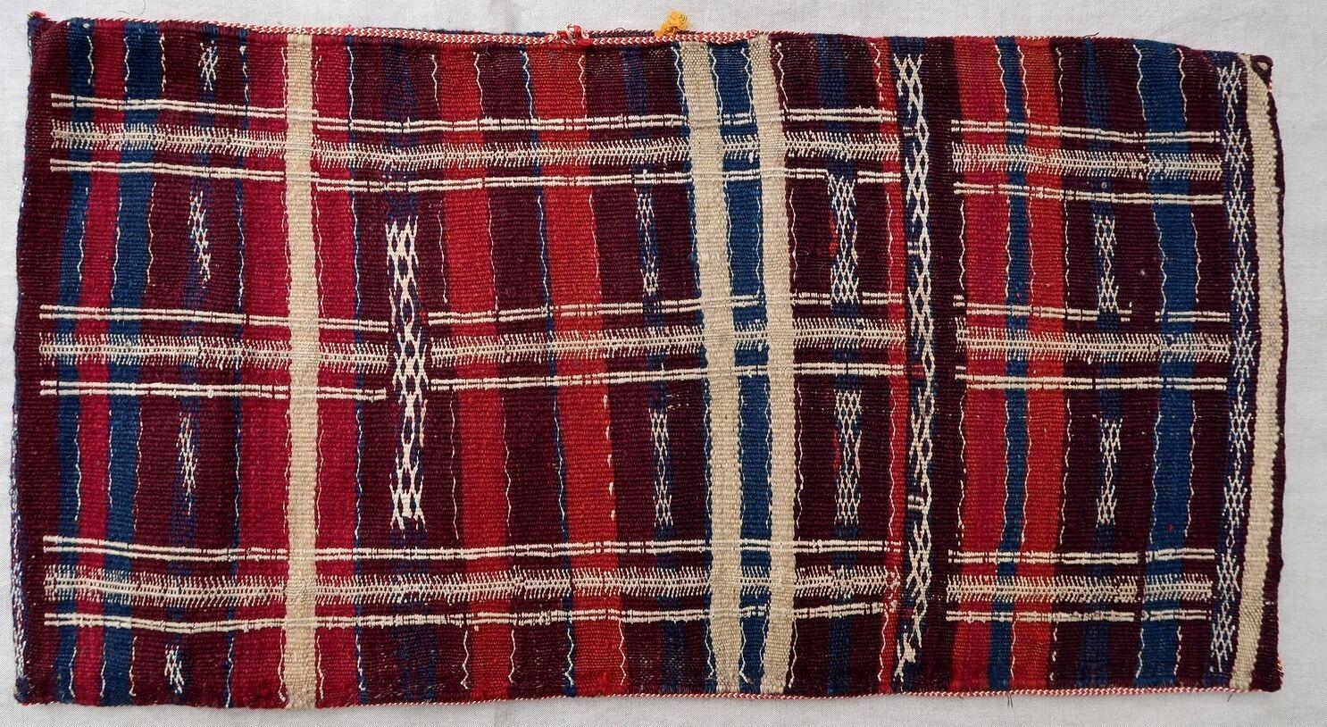 Handmade vintage Moroccan Berber cushion made out of vintage kilim. The flat-weave is from the mid-20th century, it is in original good condition. 

- Condition: original good,

- circa: 1950s,

- Size: 1.4' x 2.7' (43cm x 83cm),

-