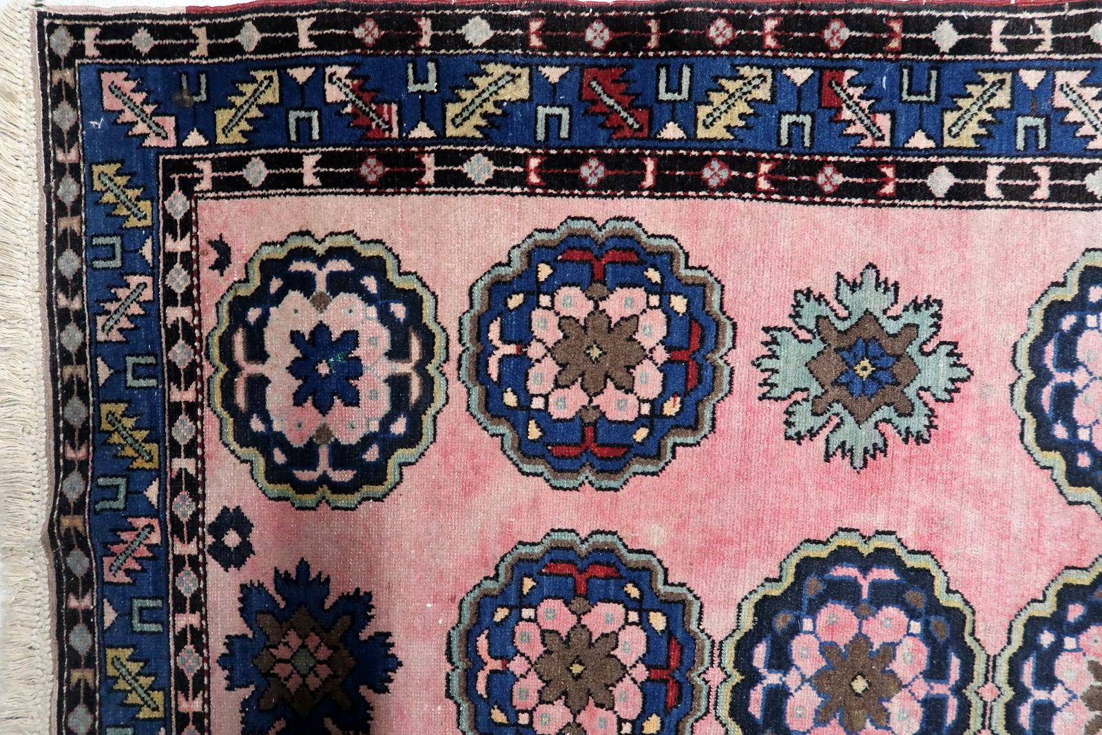 Charming Vintage Malayer Rug (Middle East), Circa 1950s
Discover this captivating vintage Malayer rug, hand-knotted from pure wool in the Middle East during the 1950s. This piece beautifully blends traditional nomadic motifs with a highly