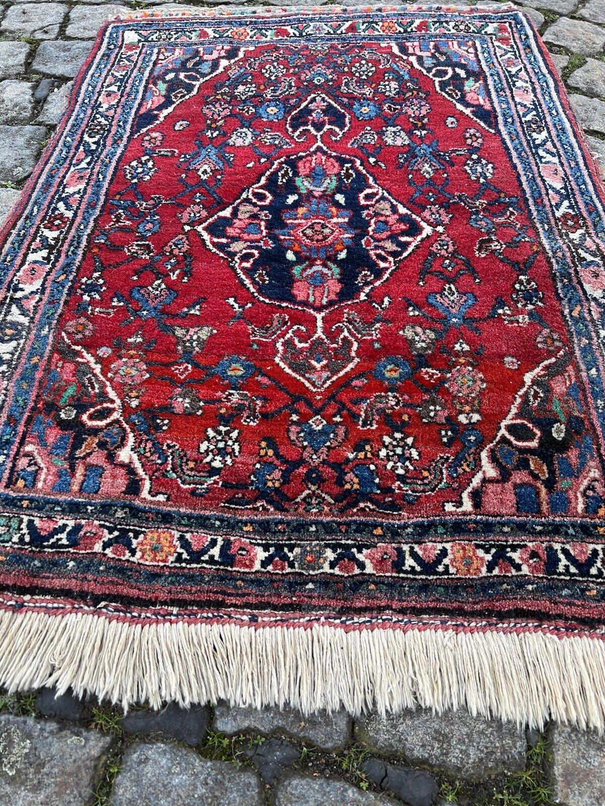 Handmade Vintage Persian Style Bidjar Rug
Overview:
Step into the splendor of our Handmade Vintage Persian Style Bidjar Rug, a testament to rich tradition and enduring craftsmanship. This authentic piece, dating back to the 1970s, exudes timeless