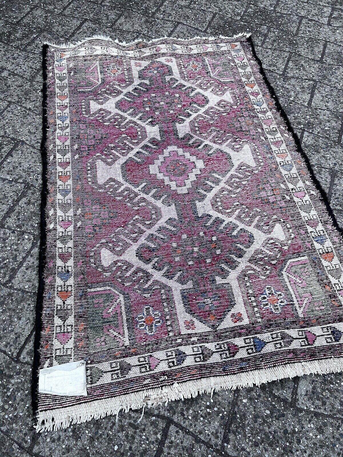 Discover the allure of our Handmade Vintage Persian Style Hamadan Rug, a piece steeped in history from the 1960s. This rug exemplifies the traditional craftsmanship and intricate designs that are characteristic of Hamadan weaving.

Dimensions: 2.7’