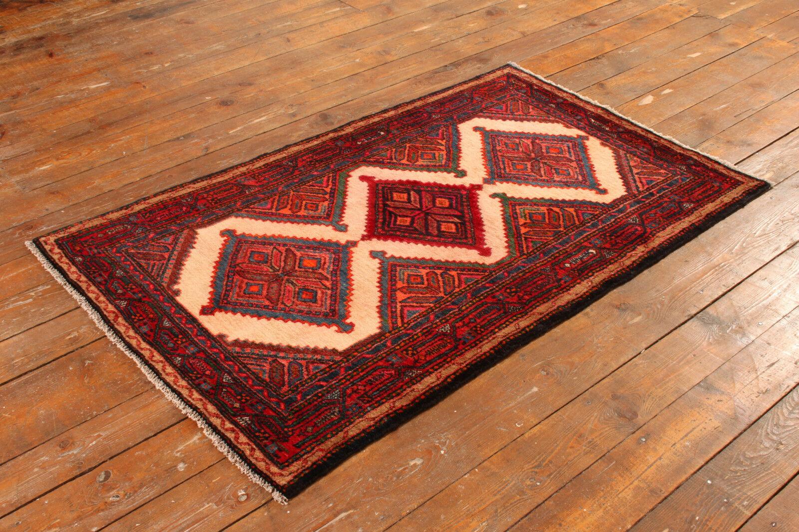 Indulge in the timeless elegance of this Handmade Vintage Persian Style Hamadan Rug. Crafted with meticulous attention to detail in the 1970s, this exquisite piece embodies the rich heritage and artistry of Persian rug-making.

Design & Pattern: The