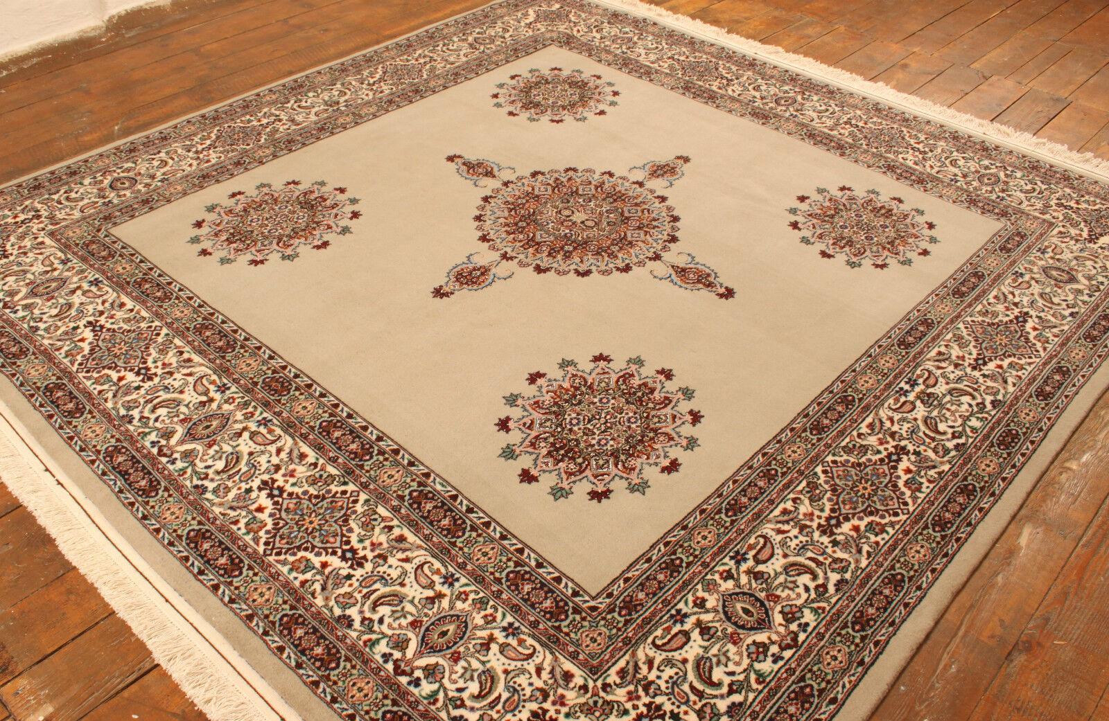 Handmade Vintage Persian Style Isfahan Rug With Silk (8.1’ x 8.7’ / 247cm x 267cm)

Indulge in the exquisite craftsmanship of our Handmade Vintage Persian Style Isfahan Rug With Silk. Crafted in the 1990s, this luxurious rug measures 8.1’ x 8.7’