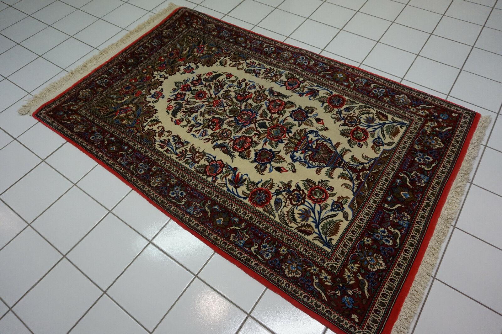 Handmade Vintage Persian Style Qum Rug

This handmade vintage Persian style Qum rug is a stunning piece of decor that will add a touch of elegance and spirituality to your home. Made in the 1970s from wool, this rug features a central oval pattern