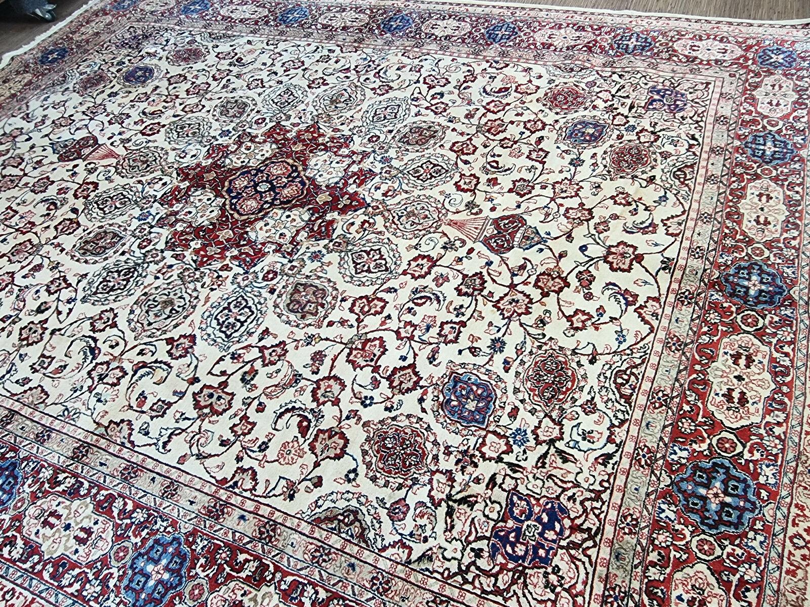 Handmade Vintage Persian Style Sarouk Rug

Add a touch of timeless elegance to your home with this Handmade Vintage Persian Style Sarouk Rug. This exquisite piece is a testament to the intricate artistry of the 1970s, boasting natural colors that