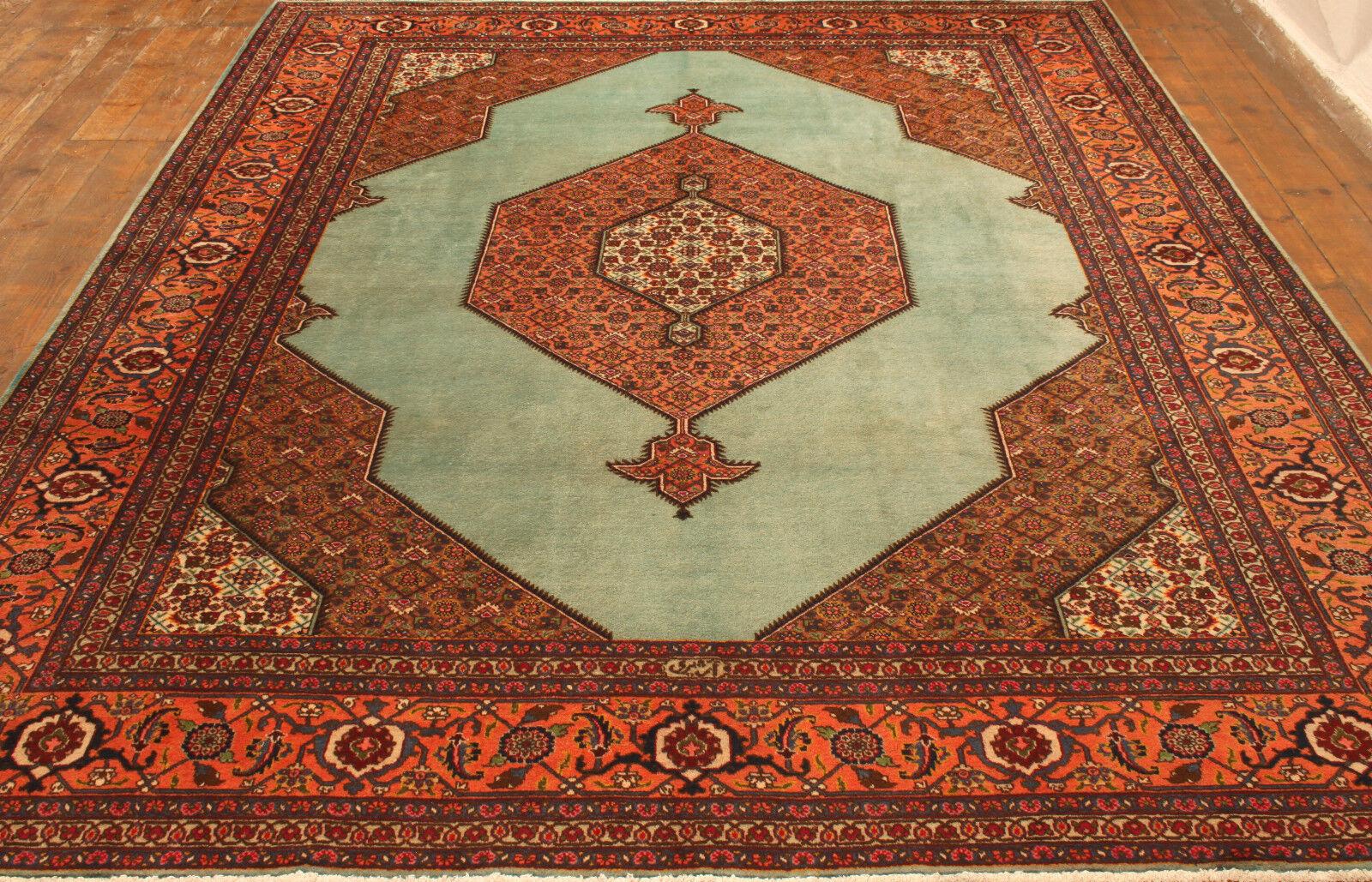 Here’s a product description for the Handmade Vintage Persian Style Tabriz Rug:

Handmade Vintage Persian Style Tabriz Rug (9.6’ x 13.2’ / 293cm x 404cm)

Immerse yourself in the intricate beauty of our Handmade Vintage Persian Style Tabriz Rug.
