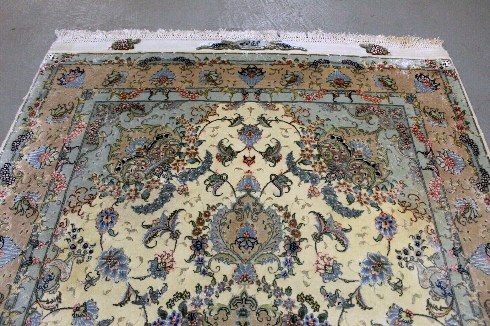 This exquisite 100cm x 165cm vintage Persian Tabriz rug, crafted in the 1970s, is a true masterpiece of timeless elegance. Its intricate design and luxurious materials make it a remarkable addition to any space. Let’s delve into the