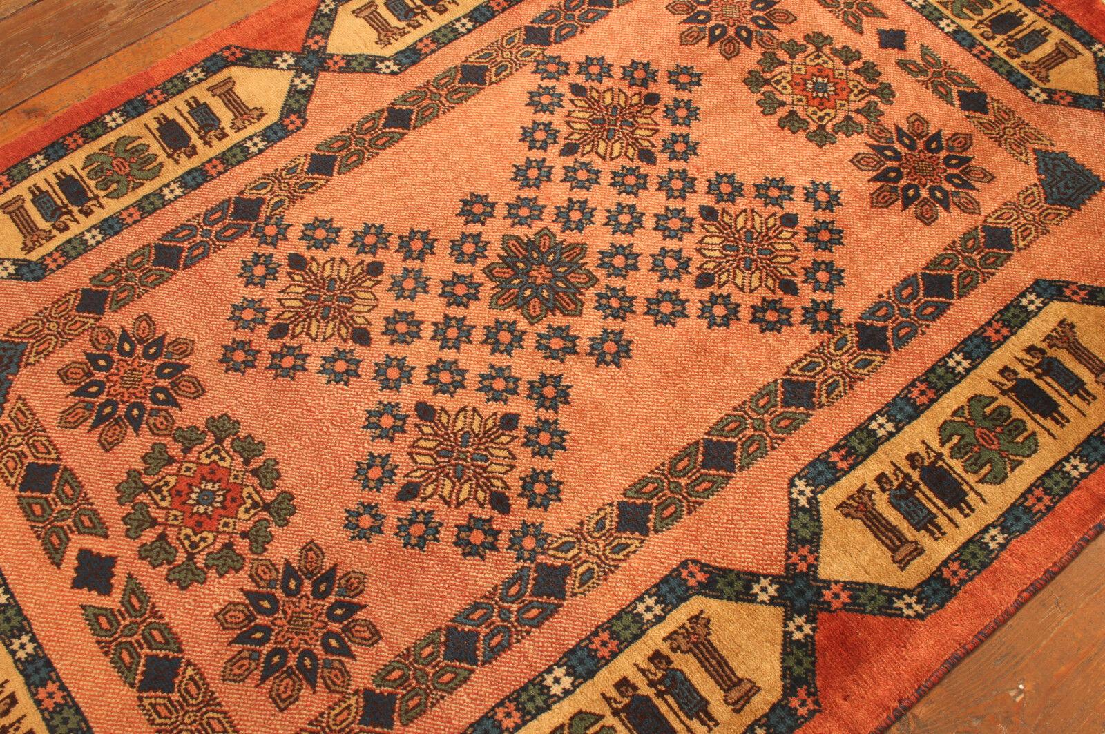 Discover the charm of a bygone era with this vintage handmade rug, crafted in the 1990s. This Persian Style Yalameh area rug is a testament to the artistry and craftsmanship of its weavers. Made entirely of high-quality wool, it is in good