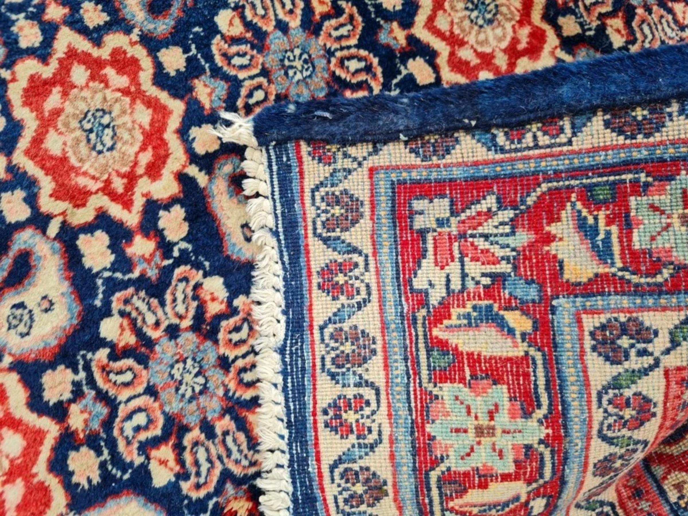 Discover the Enduring Allure of Tabriz Weaving
This magnificent handmade vintage Persian Tabriz rug, dating from the 1960s, embodies the sophisticated artistry for which Tabriz, one of Persia's most celebrated rug-weaving centers, is renowned.