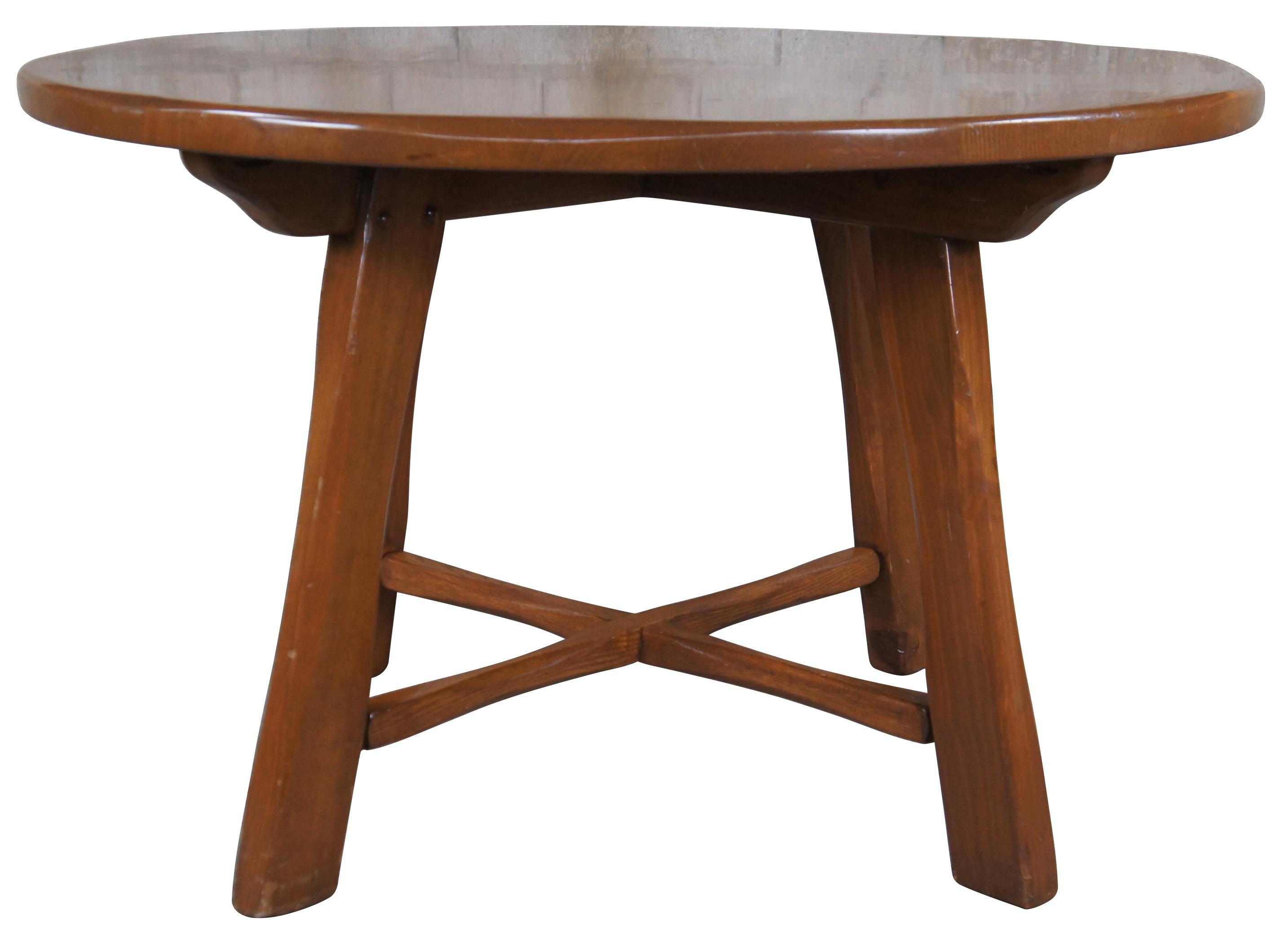 Handmade vintage farmhouse dining table. Features a solid pine top over an oak base. Made in Darien Connecticut circa 1960s.
 