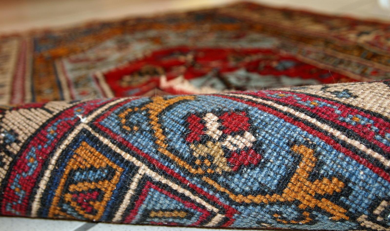 This vintage prayer Turkish rug made in colorful shades of wool. The rug is quite thick and soft. Beautiful beige border with colorful houses on it. The rug is in original good condition.

-condition: original good,

-circa: 1950s,

-size: