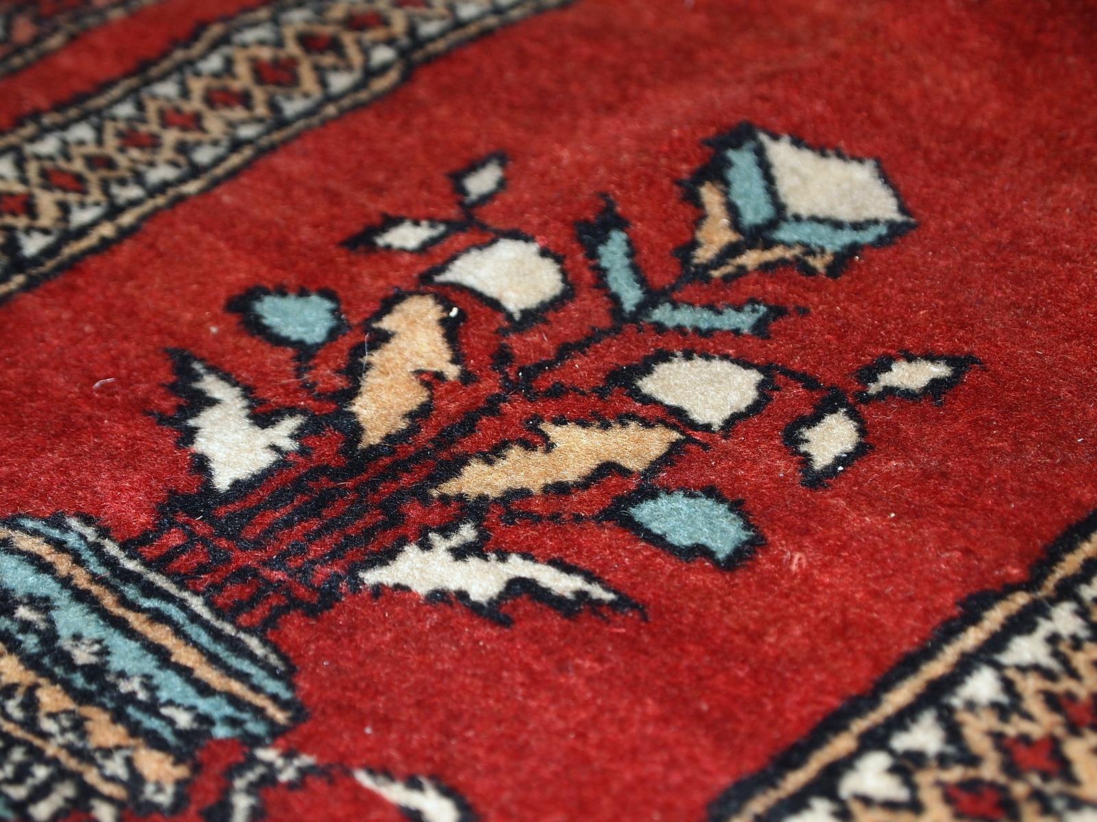 Handmade vintage prayer Turkish Konya rug in original good condition. Bright shade of red and beautiful decorative border.

