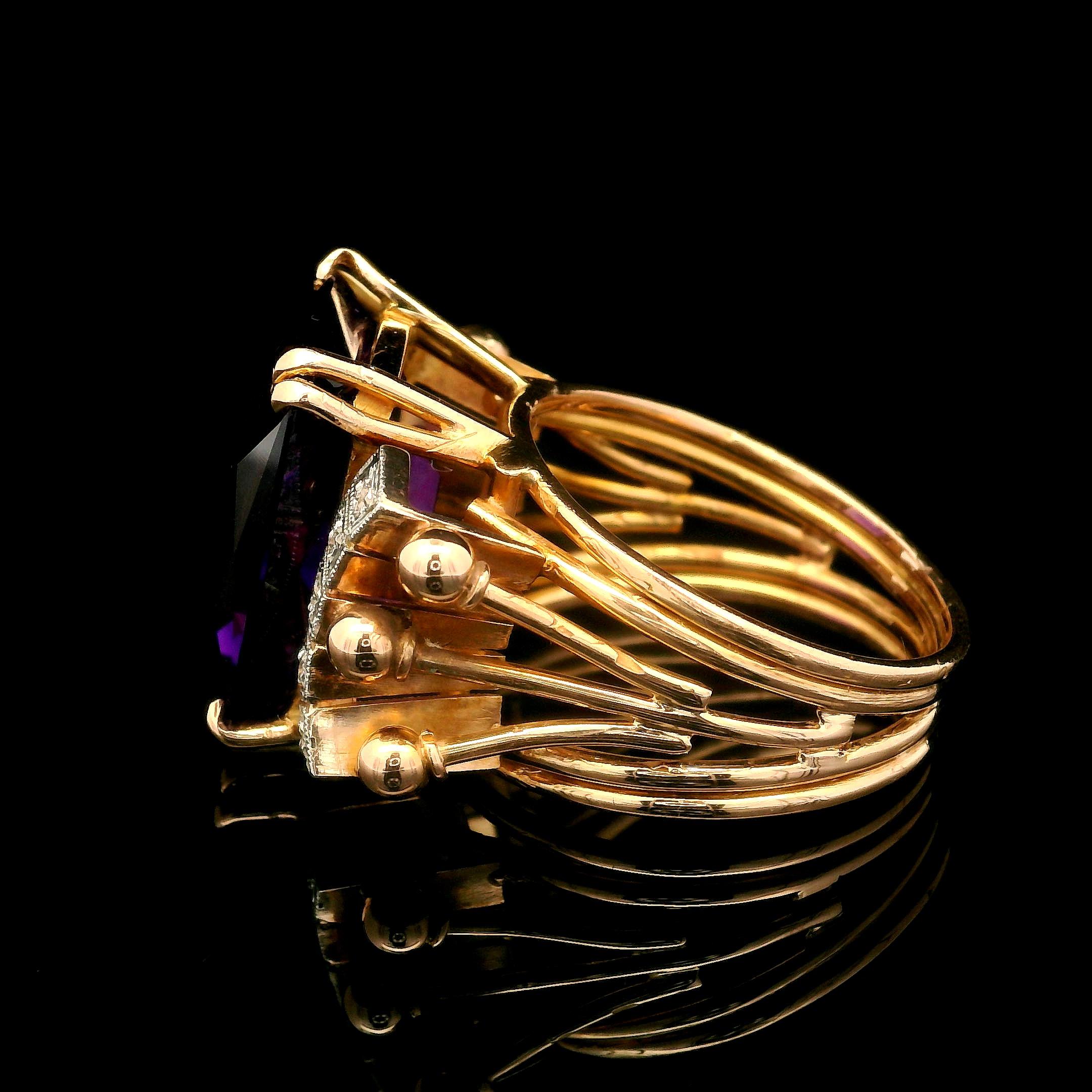 –Stone(s)–
(1) Natural Genuine Amethyst - Rectangular Faceted Cut - Prong Set - Deep Royal Purple Color  - 18 x 13mm (approx.) - 14.50ctw (approx.)
(10) Natural Genuine Diamond - Rose Cut - Pave Set - White Color 

Material:  18k Rosy Yellow Gold -