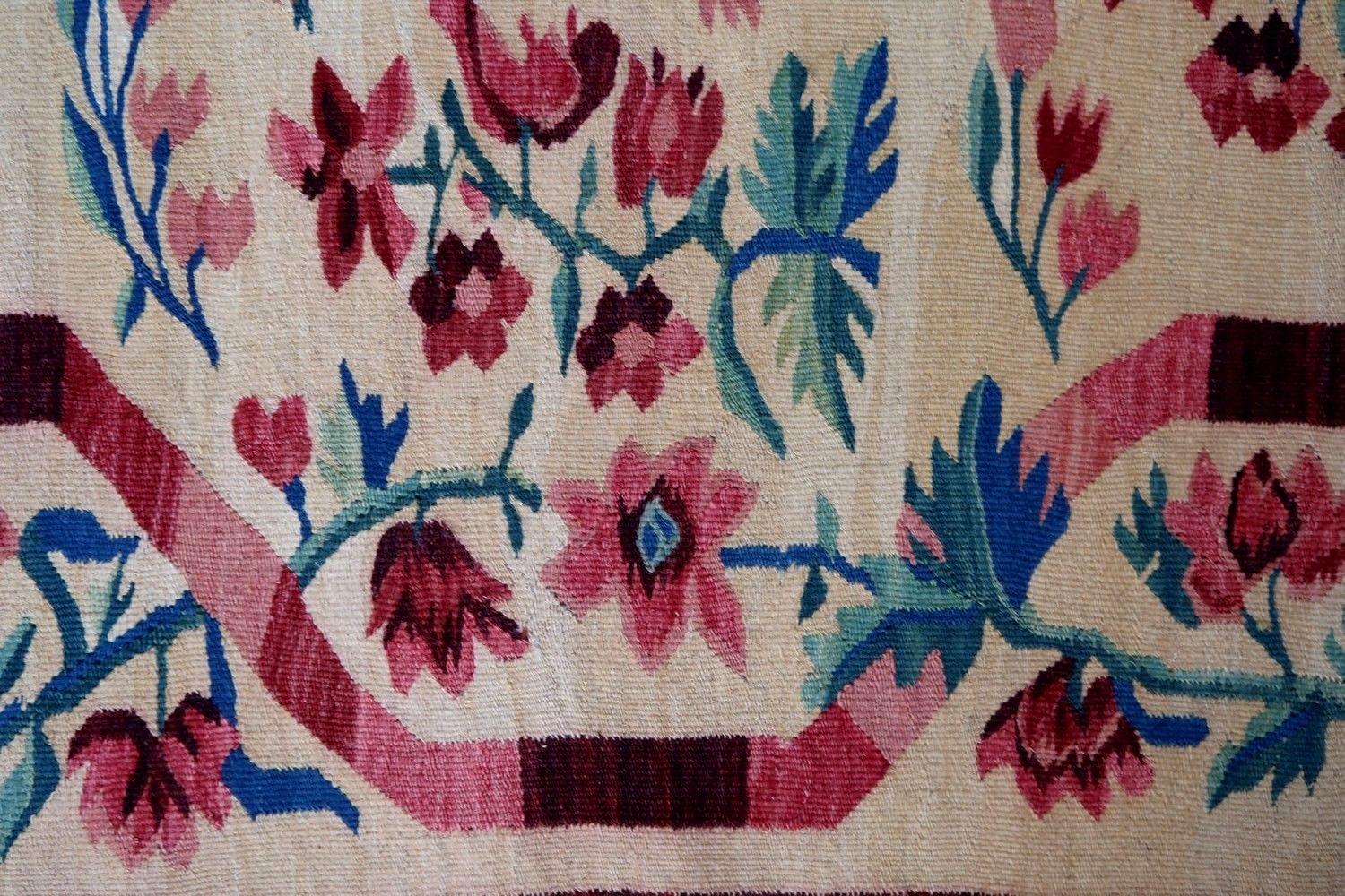 Handmade vintage Bessarabian kilim from Romania in decorative design. Vegetable dyes, the rug is in original good condition, made in the middle of 20th century

- Condition: Original good, 

- circa 1950s,

- Size: 5.5' x 8.2' (170cm x