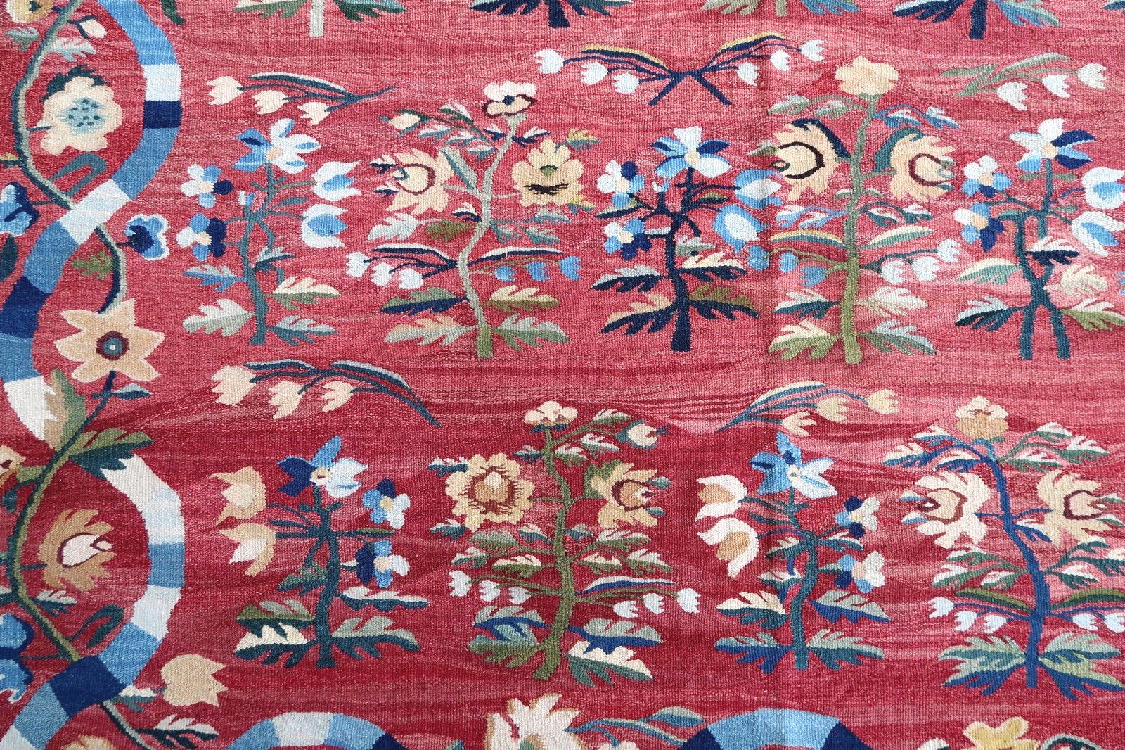 Handmade vintage Bessarabian kilim from Romania in decorative design. Vegetable dyes, the rug is in original good condition, made in the mid-20th century

- Condition: original good, 

- circa 1950s,

- Size: 5.6' x 8.3' (171cm x 255cm),

-