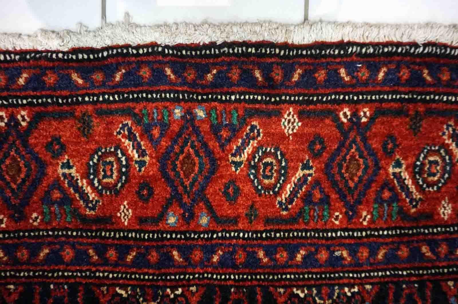 Handmade vintage Senneh rug in kele size and traditional design. The rug is from the end of 20th century in original good condition.

-condition: original good,

-circa: 1970s,

-size: 4.8' x 11.6' (149cm x 354cm),

-material:
