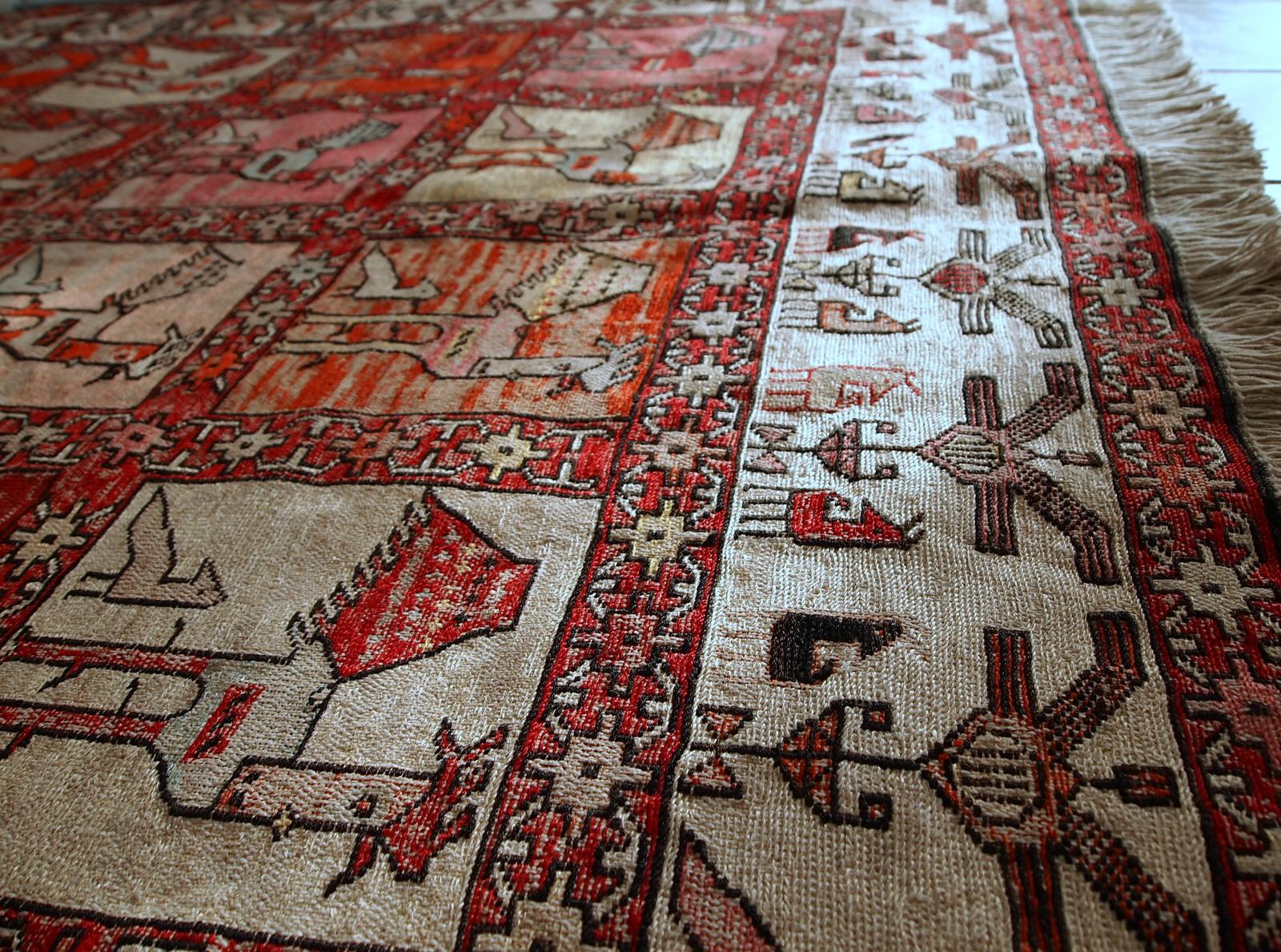 Vintage Persian flat-weave in original good condition. This Kilim was made out of artificial silk on cotton base. It has very unusual design of repeated roosters in different shades. It has been made with an accent of warn effect, but it is actually