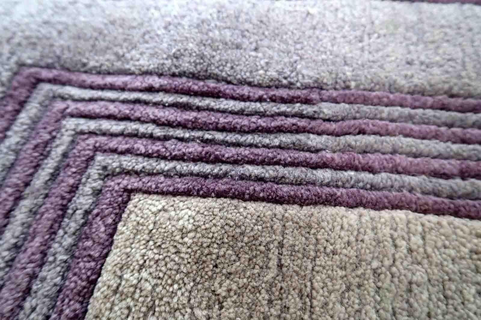 Handmade vintage Tibetan Khaden rug in geometric design. The rug has been made in wool in the end of 20th century. It is in original good condition.

-condition: original good,

-circa: 1960s,

-size: 2.3' x 4.6' (73cm x 142cm),

-material: