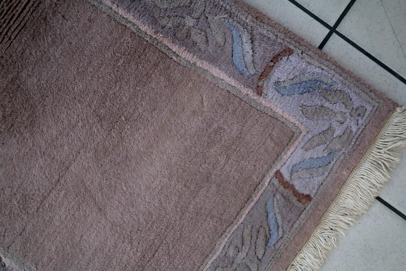 Handmade vintage Tibetan Khaden rug in original good condition. The rug has been made in Nepal, it is from circa1970s.


-condition: original good,

-circa: 1970s,

-size: 2.3' x 4.6' (71cm x 141cm),

-material: wool,

-country of origin: