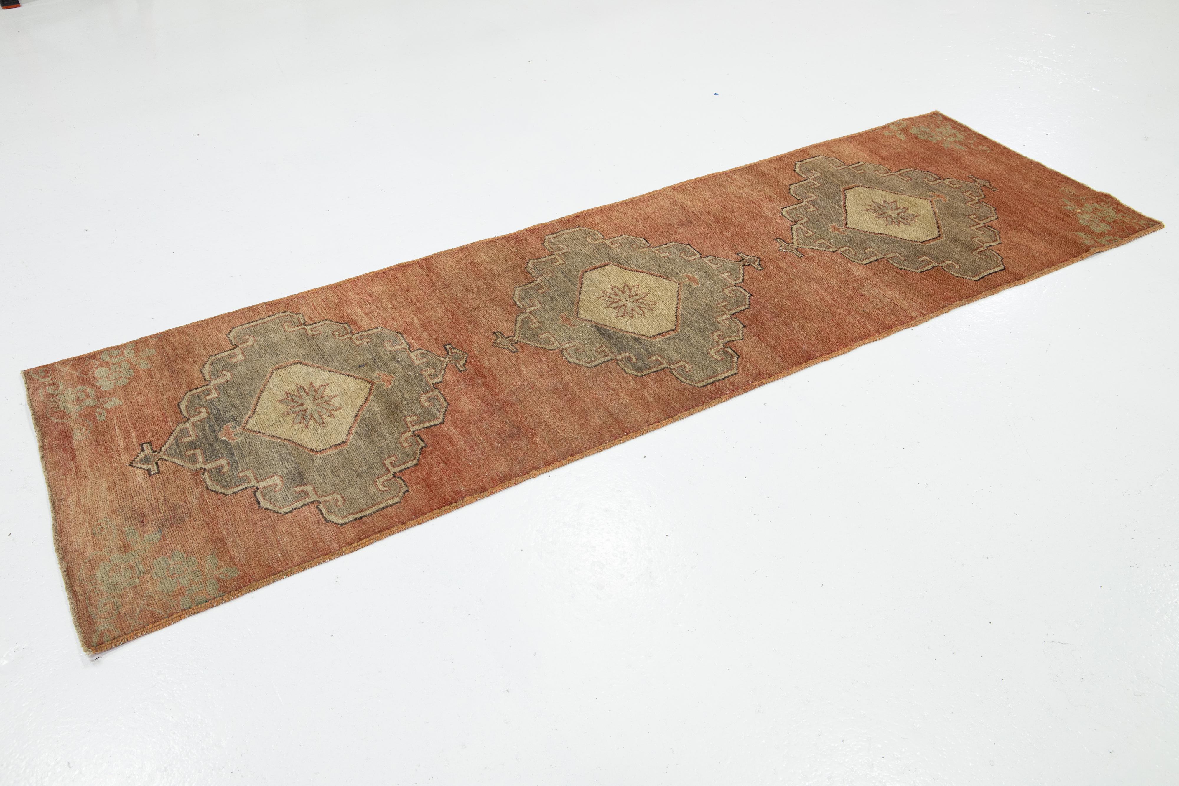 Mid-Century Modern Handmade Vintage Turkish Anatolian Wool Runner In Terracotta with Tribal Motif For Sale