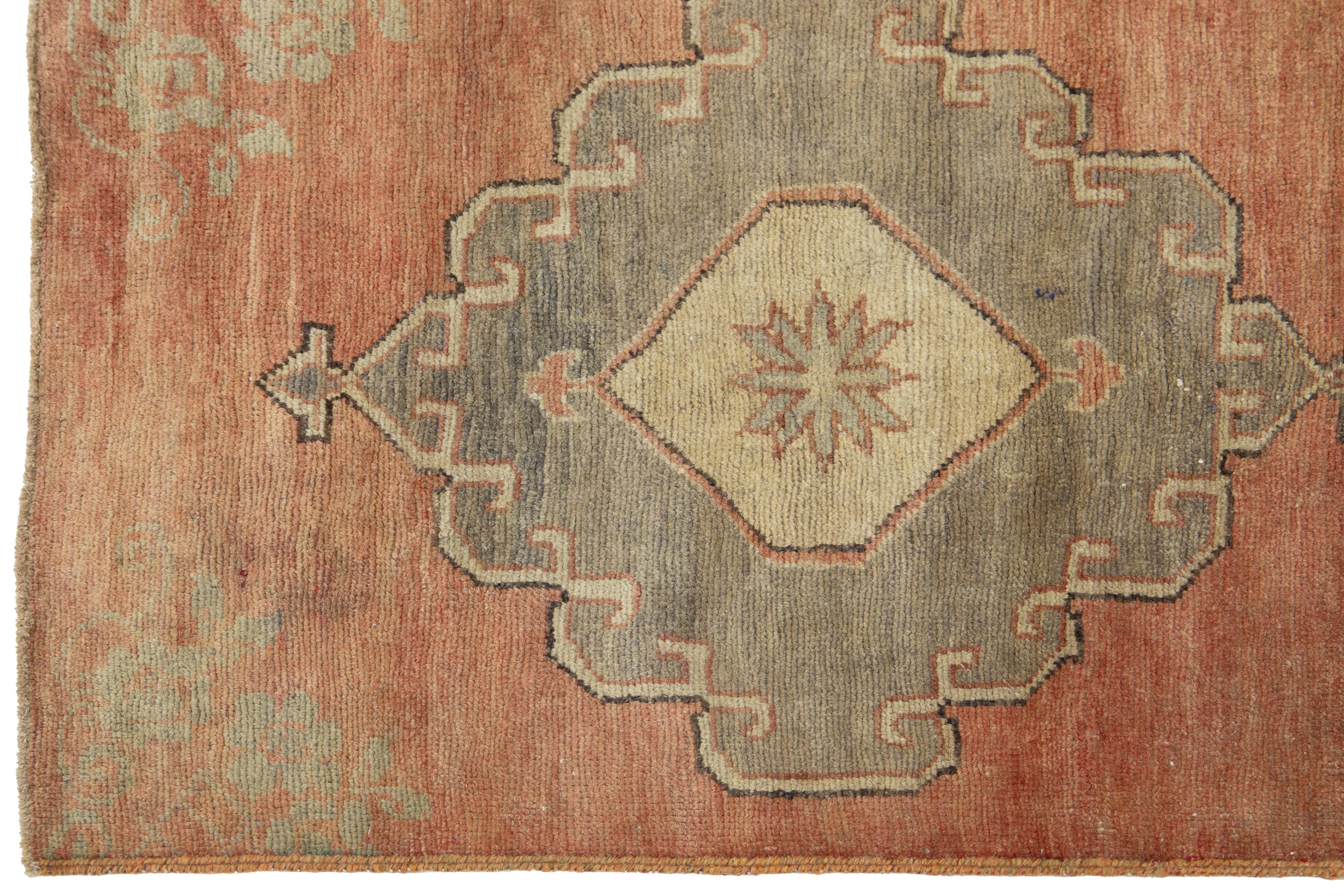 Handmade Vintage Turkish Anatolian Wool Runner In Terracotta with Tribal Motif For Sale 1