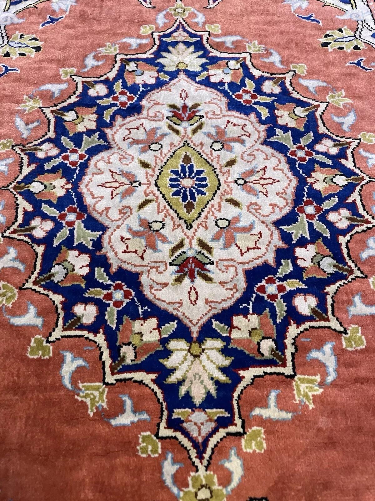 Unparalleled Luxury: Vintage Handmade Turkish Kayseri 100% Silk Rug
Indulge in the exquisite beauty of this handmade vintage Turkish Kayseri rug, meticulously crafted from 100% pure silk, pile on silk foundation, in Turkey around the 1970s. Kayseri