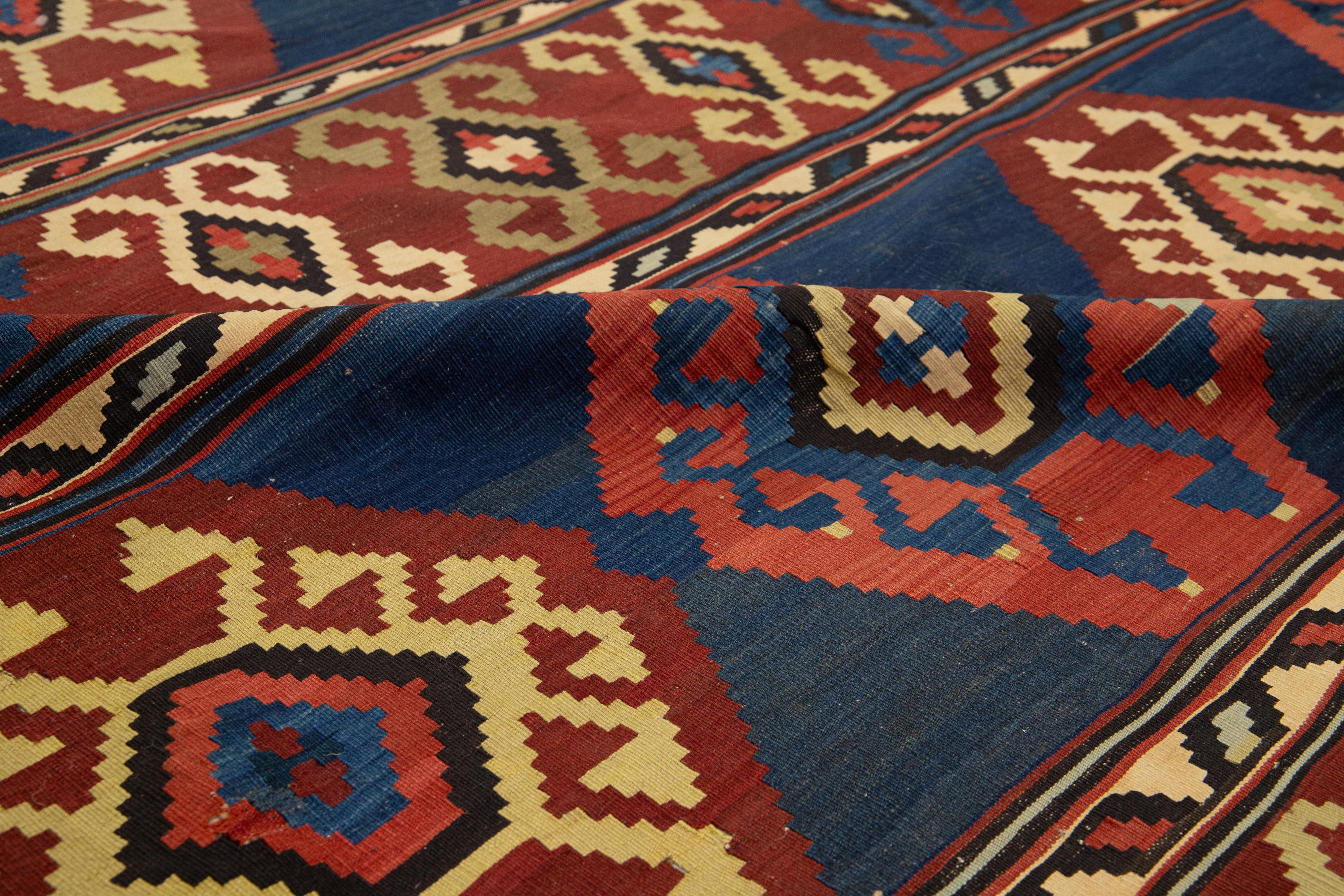 Hand-Knotted Handmade Vintage Turkish Kilim Wool Rug Allover Geometric In Blue and Red For Sale
