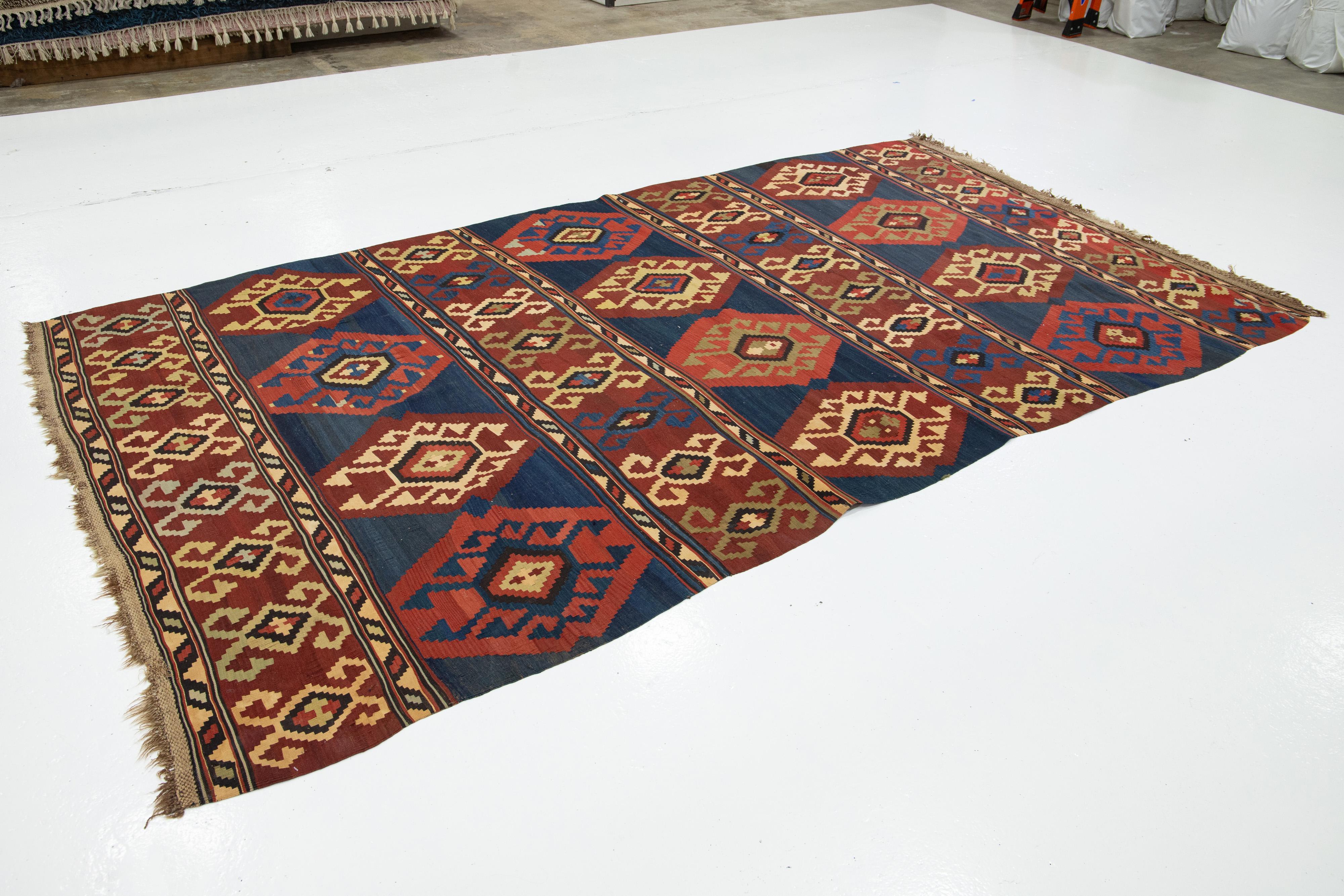 Handmade Vintage Turkish Kilim Wool Rug Allover Geometric In Blue and Red In Good Condition For Sale In Norwalk, CT
