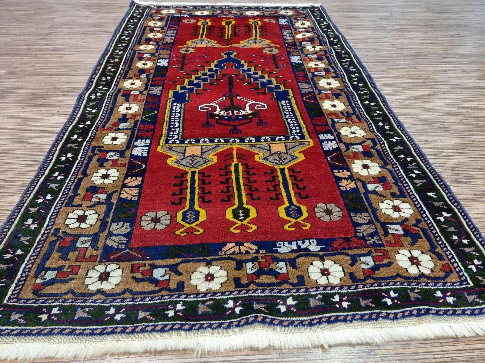 This handmade vintage Turkish Konia rug from the 1960s is a beautiful example of traditional craftsmanship. Measuring 6 feet (183 cm) in length and 3.5 feet (108 cm) in width, this exquisite wool rug is in good condition, adding a touch of elegance