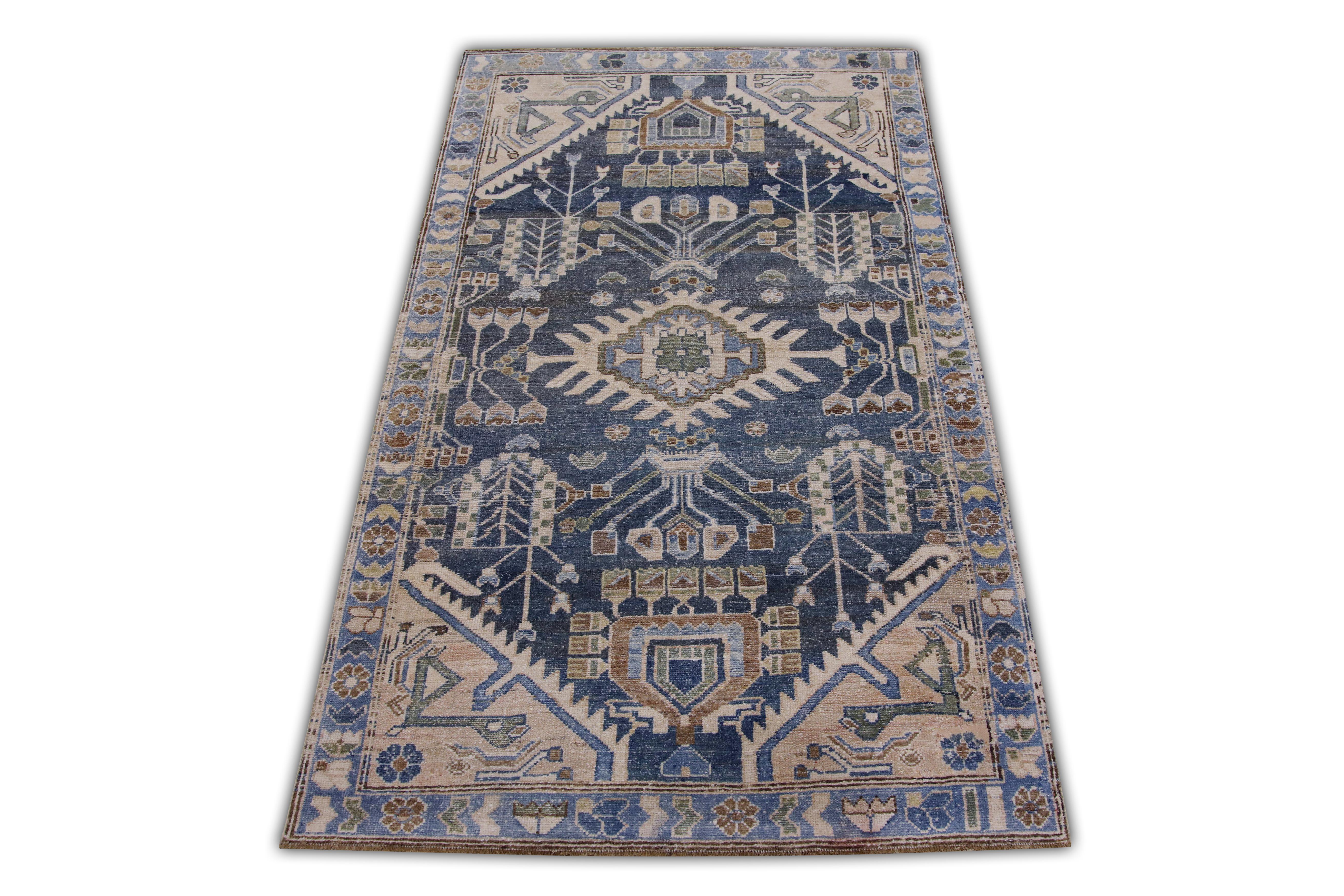 Introducing a one-of-a-kind vintage Turkish hand-knotted wool rug, carefully crafted by skilled artisans using traditional techniques passed down through generations. This exquisite rug boasts a stunning array of natural dyes, resulting in a rich