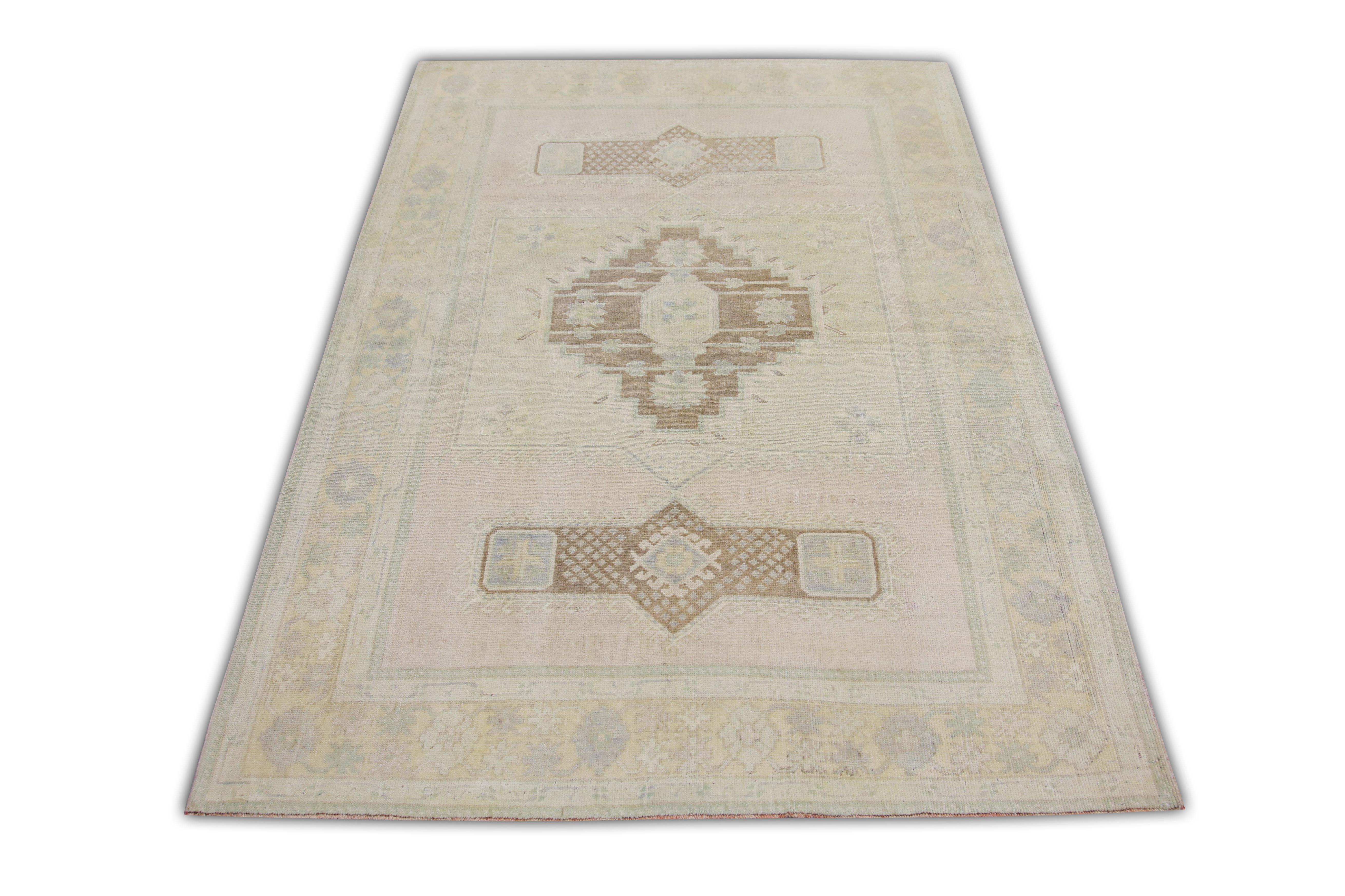 Introducing a one-of-a-kind vintage Turkish hand-knotted wool rug, carefully crafted by skilled artisans using traditional techniques passed down through generations. This exquisite rug boasts a stunning array of natural dyes, resulting in a rich