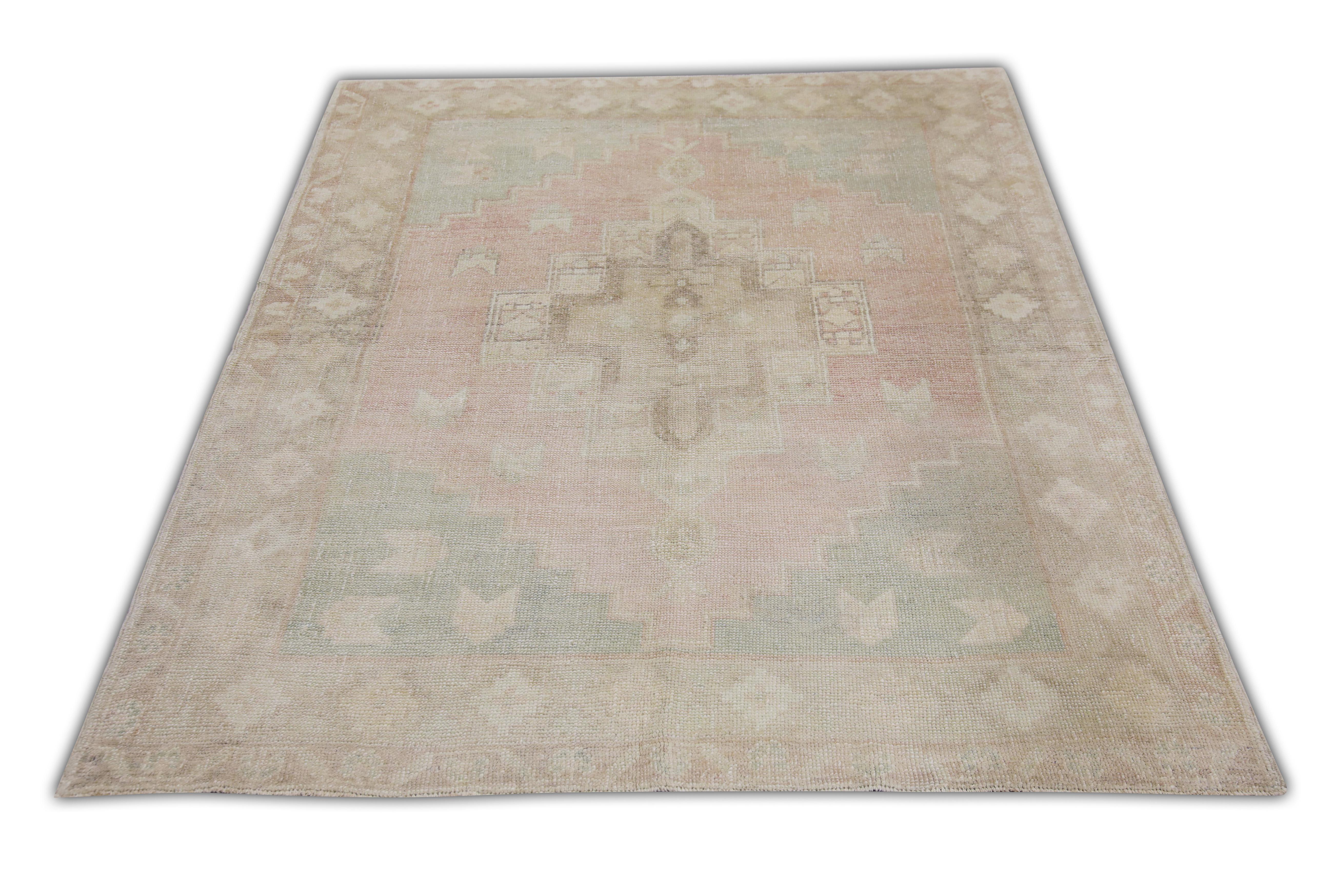 Introducing a one-of-a-kind vintage Turkish hand-knotted wool rug, carefully crafted by skilled artisans using traditional techniques passed down through generations. This exquisite rug boasts a stunning array of natural dyes, resulting in a rich
