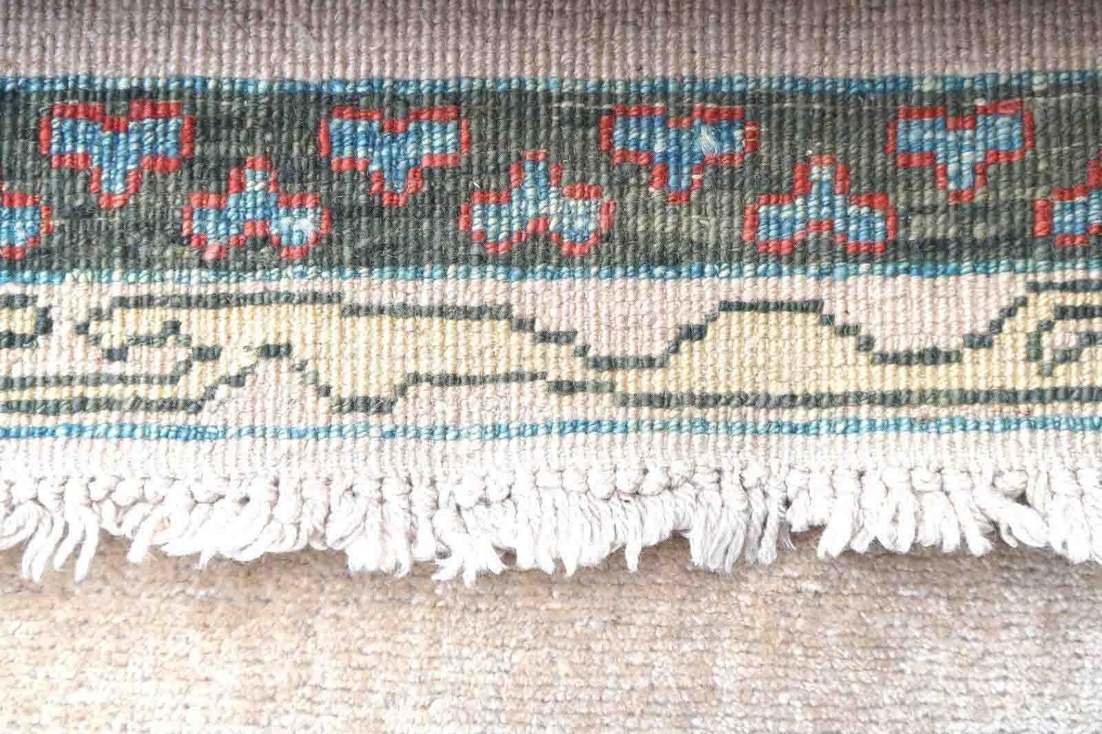 Handmade vintage Turkish runner from Sivas region in beige color. The rug is in original good condition, from the end of 20th century.

-condition: original good,

-circa: 1970s,

-size: 2.2' x 15.4' (68cm x 470cm),

-material: