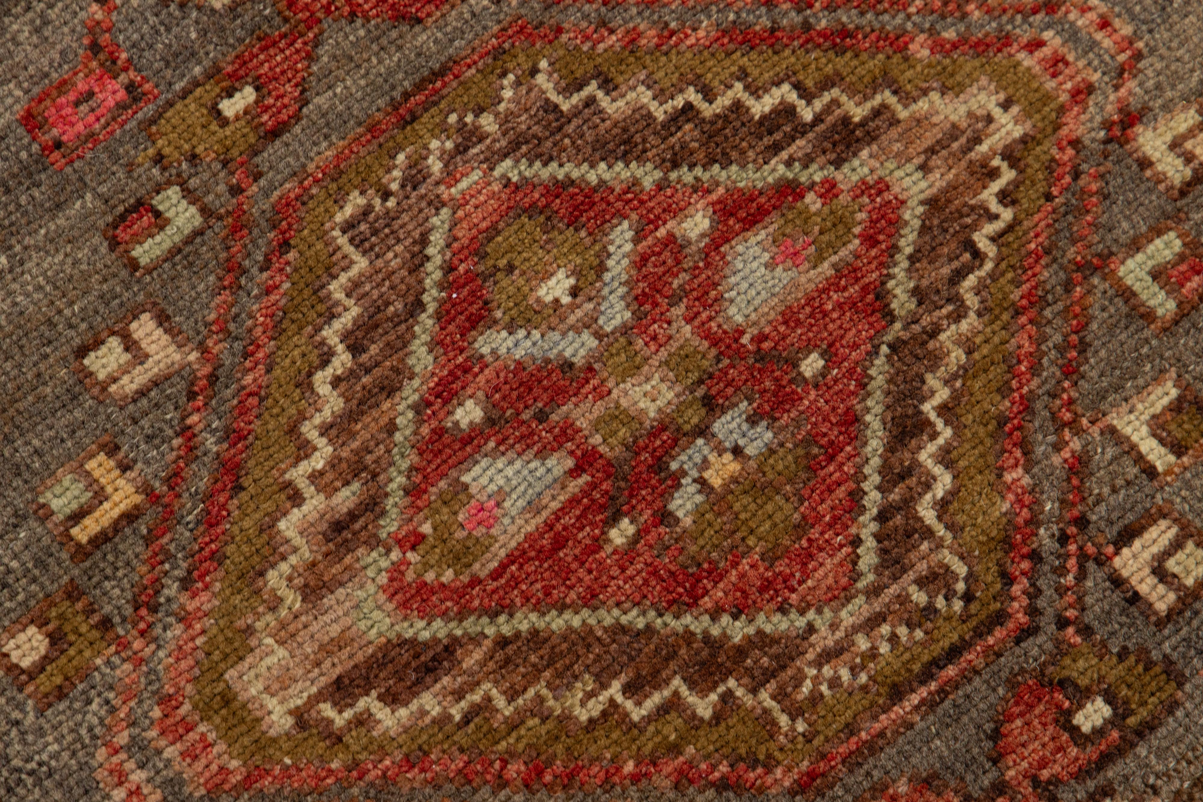 20th Century Handmade Vintage Turkish Wool Runner with Tribal Pattern For Sale