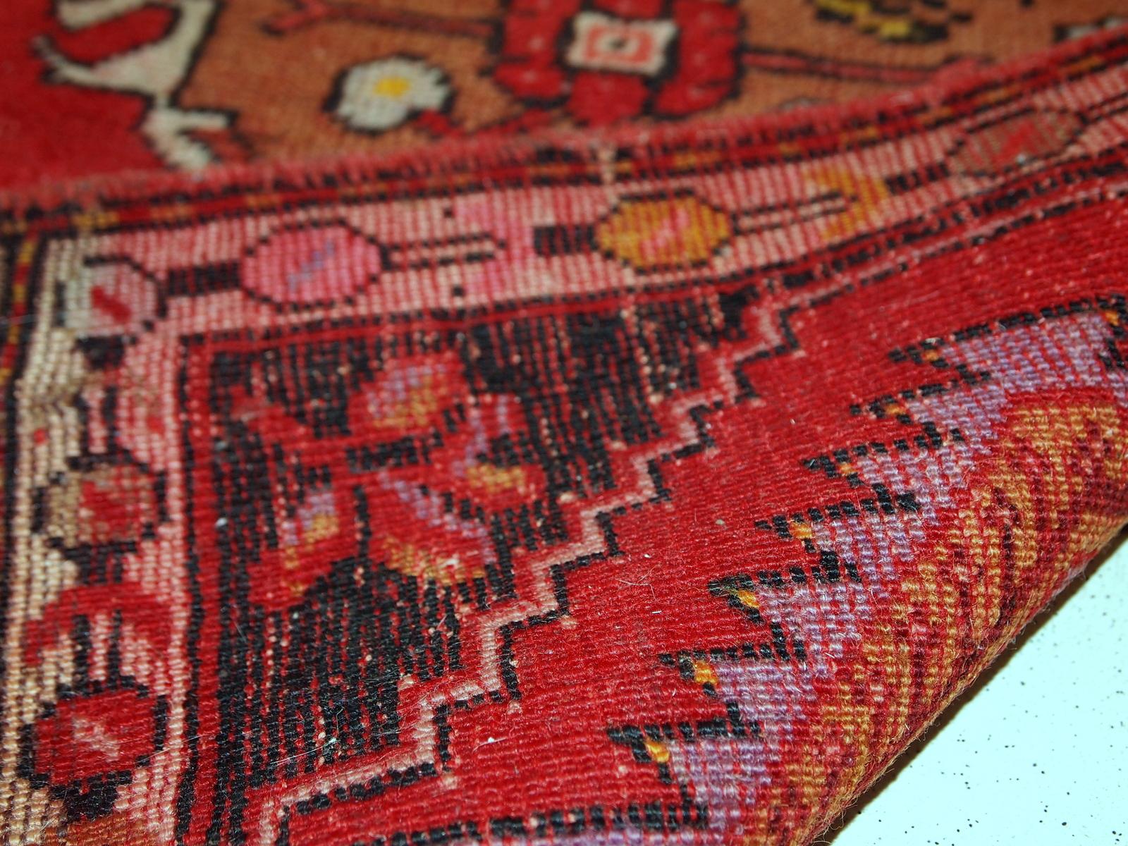 Handmade vintage Turkish Yastik rug in bright red color. The rug is in original good condition from the mid-20th century.

- Condition: original good,

- circa 1960s,

- Size: 1.6' x 3.1' (50cm x 96cm),

- Material: wool,

- Country of
