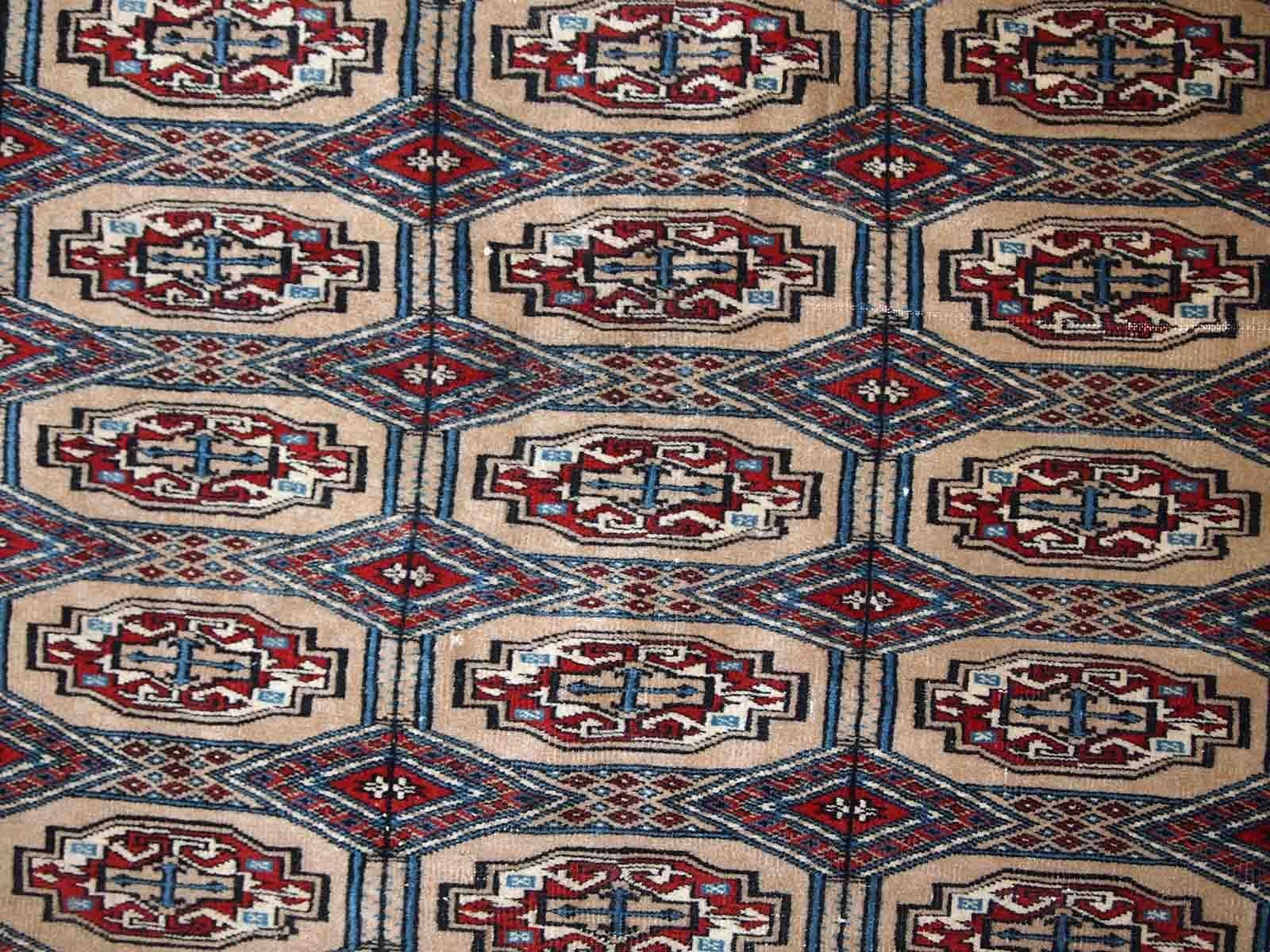 Mid-20th Century Handmade Vintage Uzbek Bukhara Rug, 1960s, 1C776 For Sale