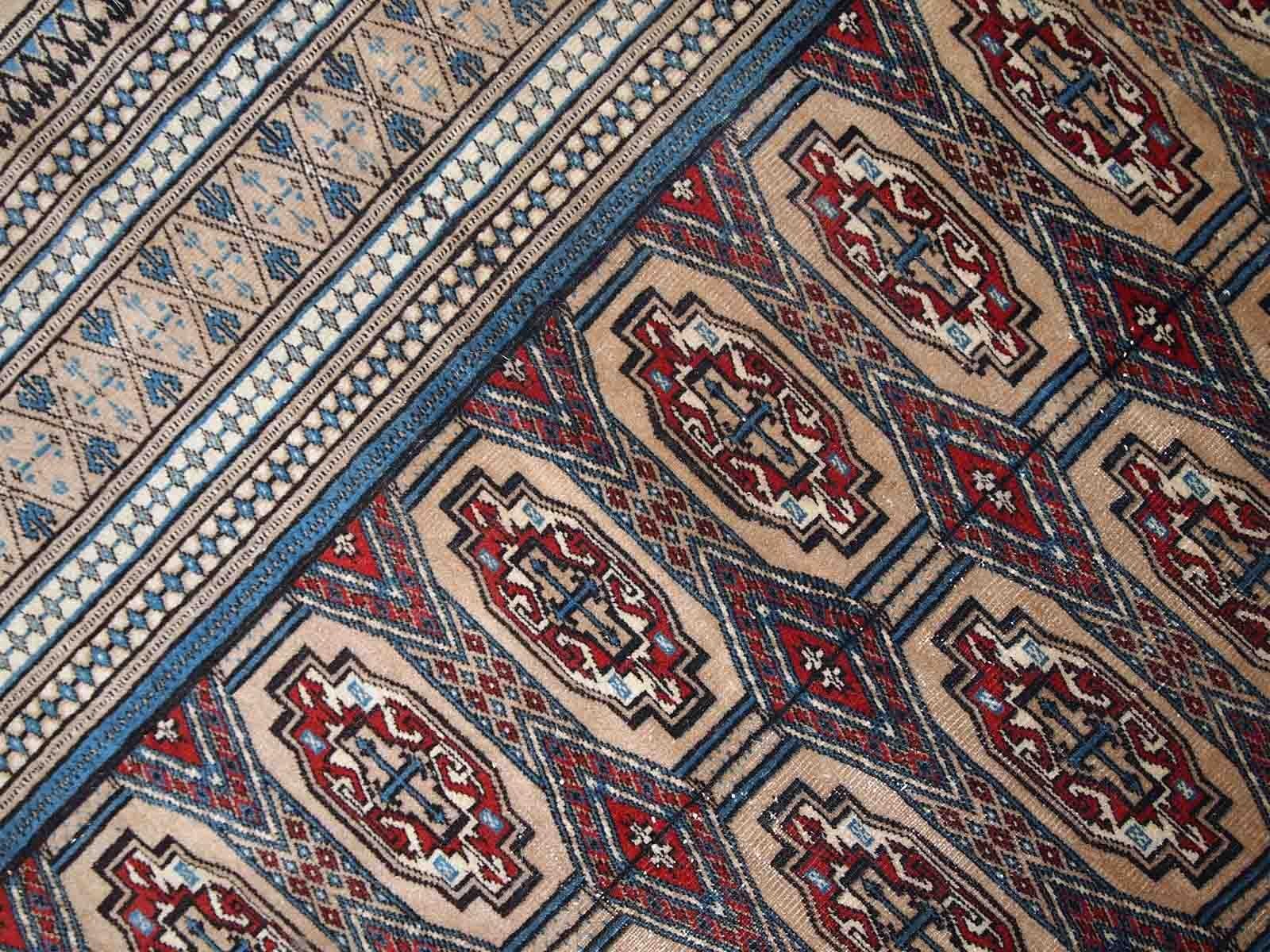 Wool Handmade Vintage Uzbek Bukhara Rug, 1960s, 1C776 For Sale