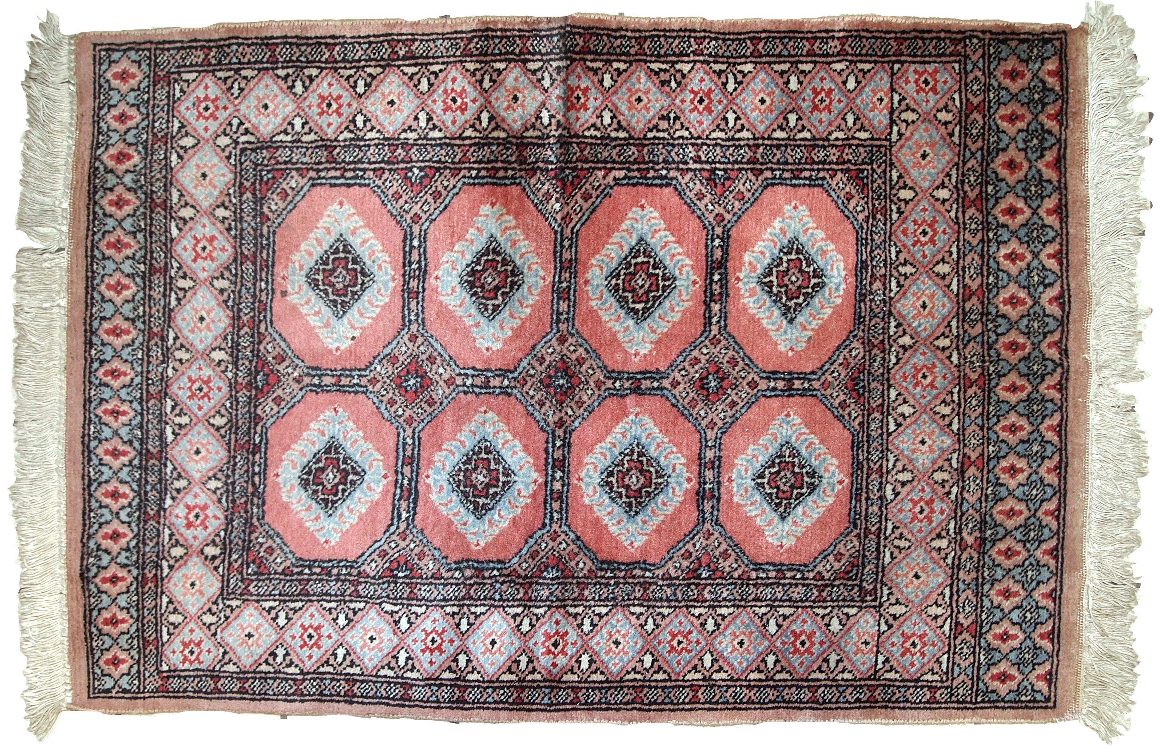 Handmade vintage Uzbek rug in pink and sky blue wool. It has been made in the middle of 20th century in Central Asia.

?-condition: original good,

-circa 1960s,

-size: 2.6' x 3.8' (81cm x 118cm),

-material: wool,

-country of origin: