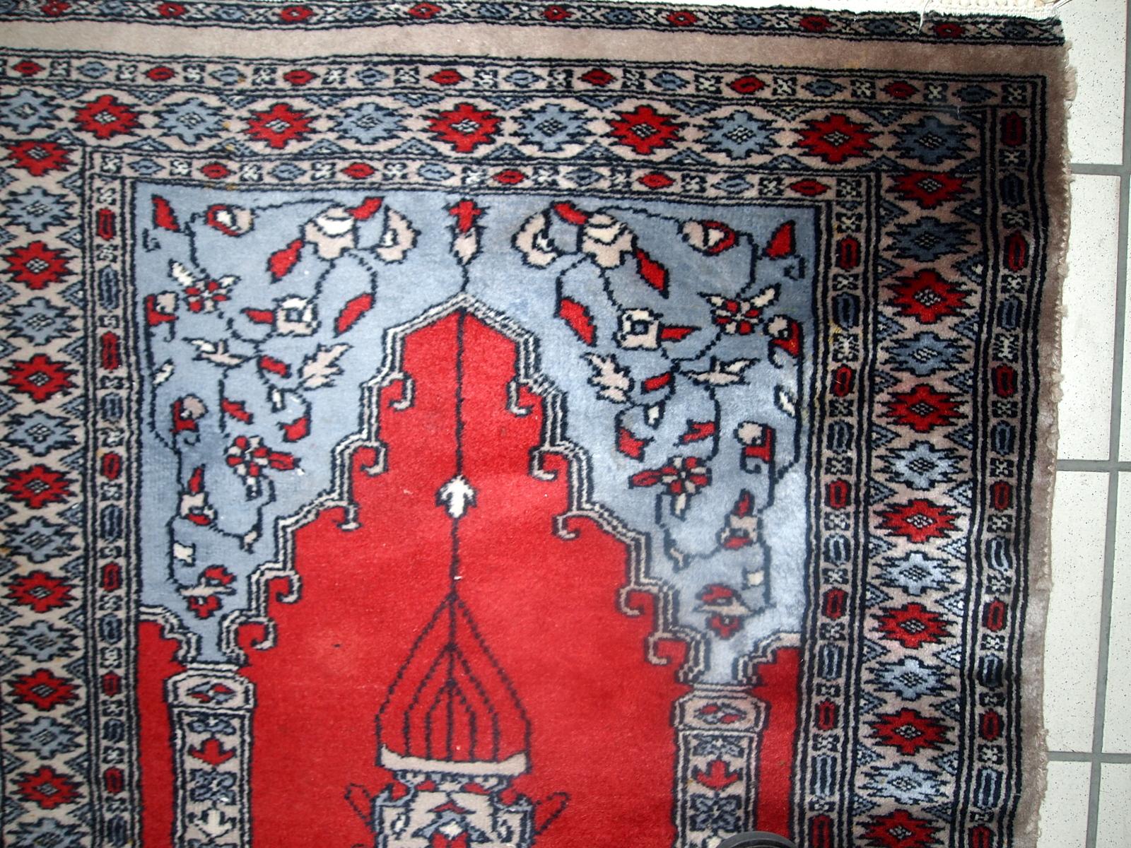 Vintage handmade rug from Uzbekistan in original good condition. The rug has been made in wool in the end of 20th century.

- Condition: original good,

- circa 1970s

- Size: 2.5' x 3.7' (78cm x 115cm)

- Material: wool,

- Country of