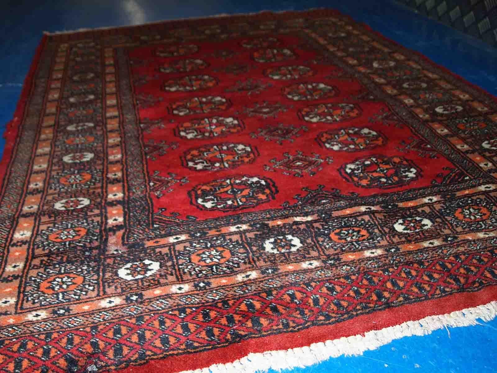 Late 20th Century Handmade Vintage Uzbek Bukhara Rug, 1970s, 1C756 For Sale