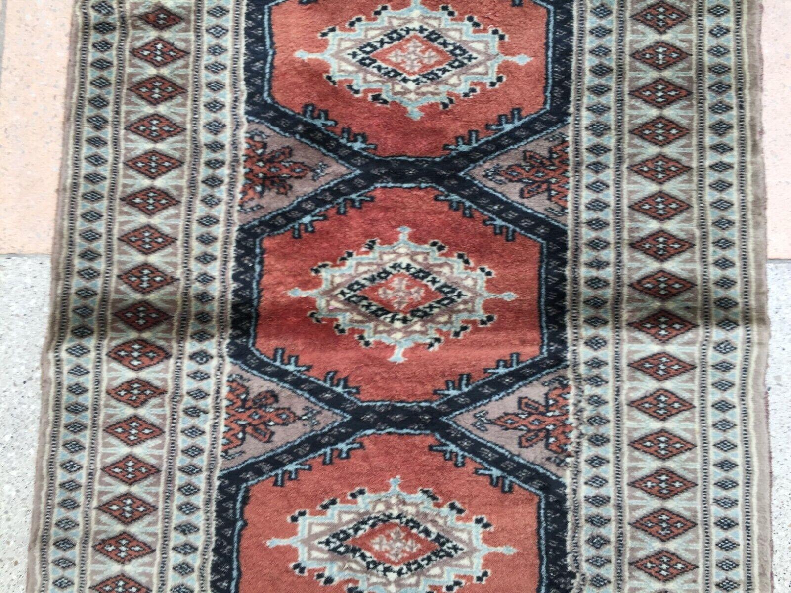 Mid-20th Century Handmade Vintage Uzbek Bukhara Rug 2' x 4.6', 1960s - 1W14 For Sale