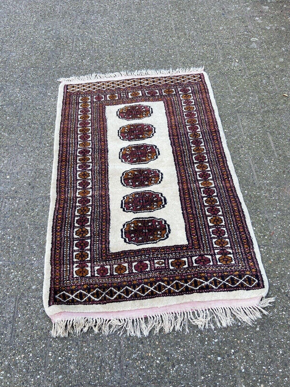Handmade Vintage Uzbek Bukhara Rug 2.7' x 4.3', 1960s - 1S09 For Sale 1