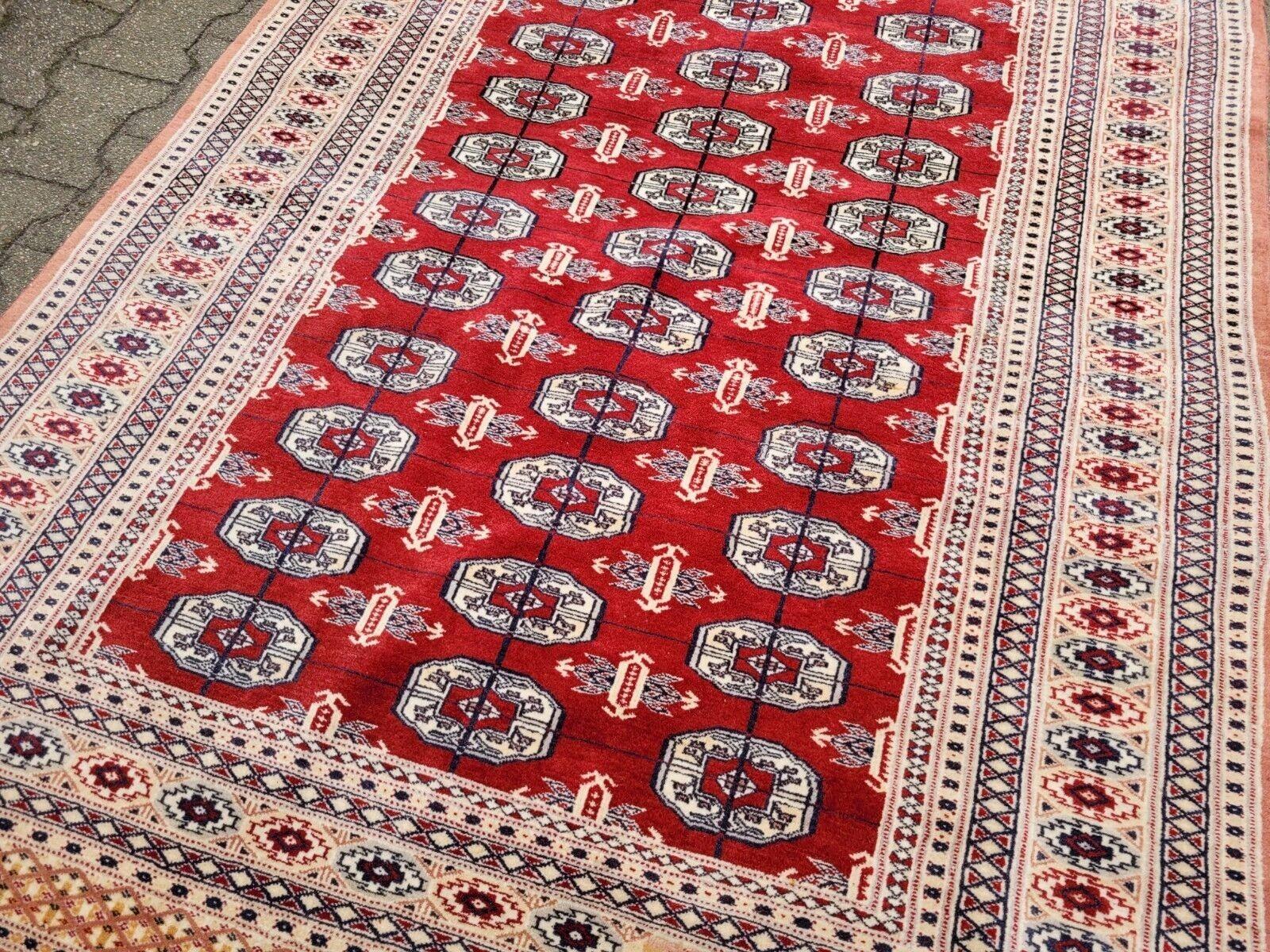 Tappeto Uzbek Bukhara vintage fatto a mano 4,2' x 5,9' 1960 - 2K22 in vendita 3
